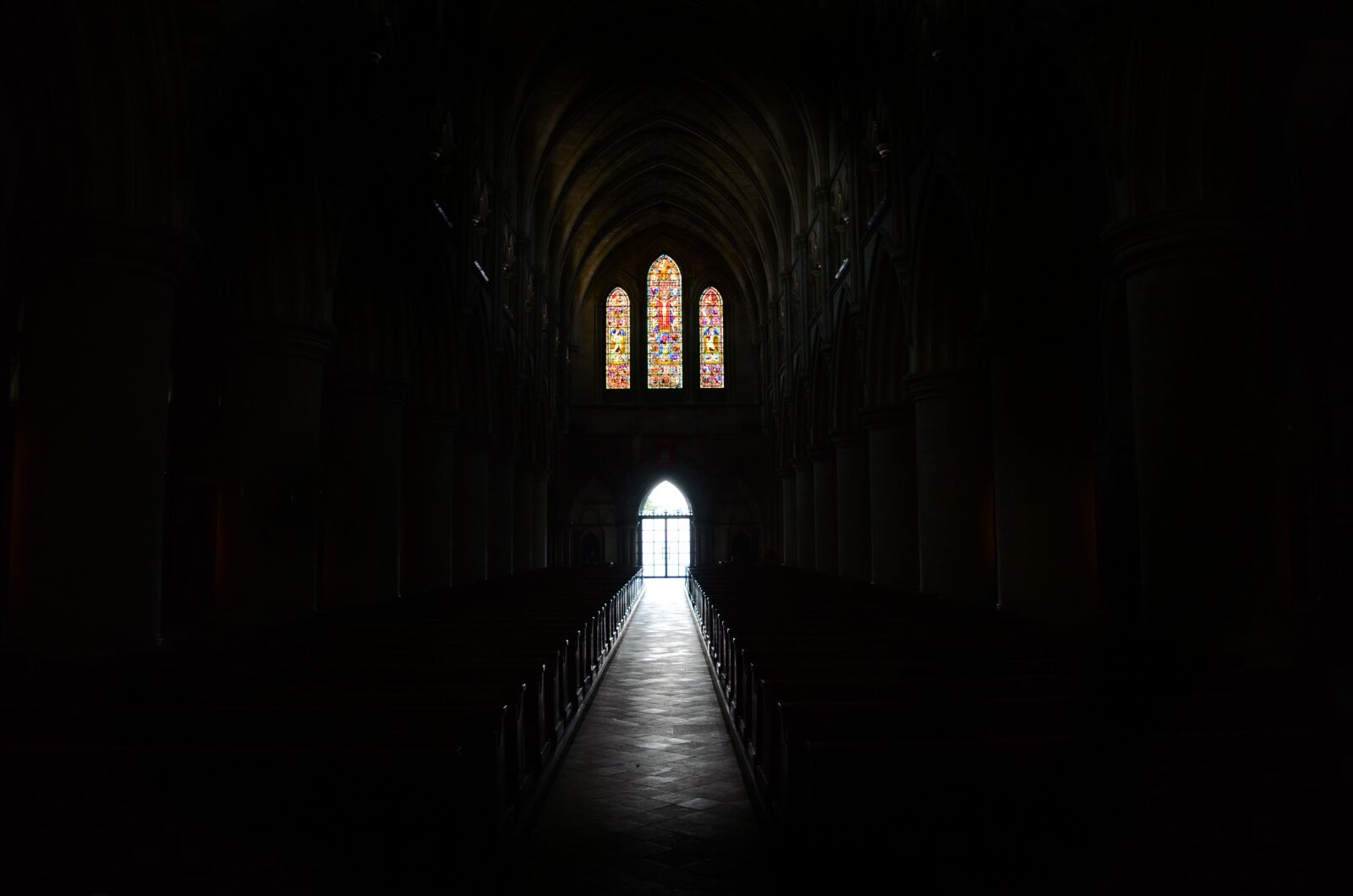 Nikon D7000 sample photo. Aisle, cathedral, darkness to photography