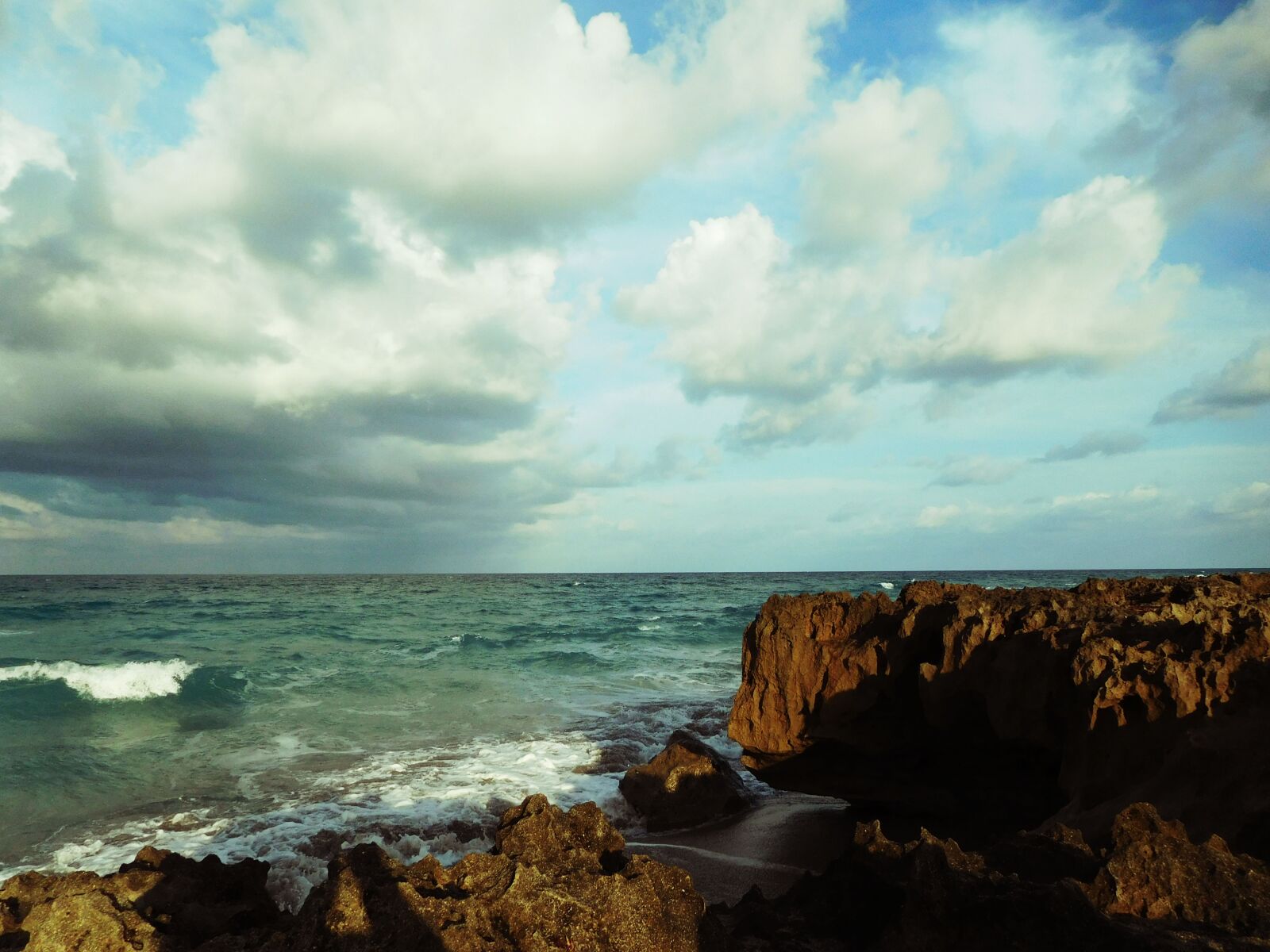 Nikon Coolpix S7000 sample photo. Ocean, water, racks photography