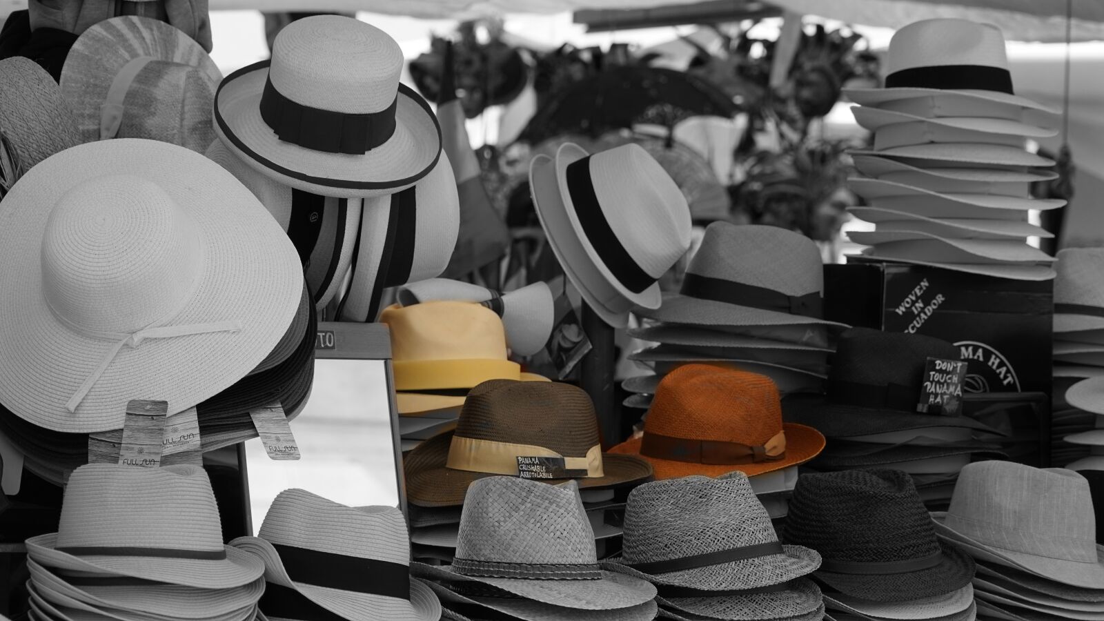 Sony a7 + Sony FE 24-240mm F3.5-6.3 OSS sample photo. Hats, sales stand, market photography