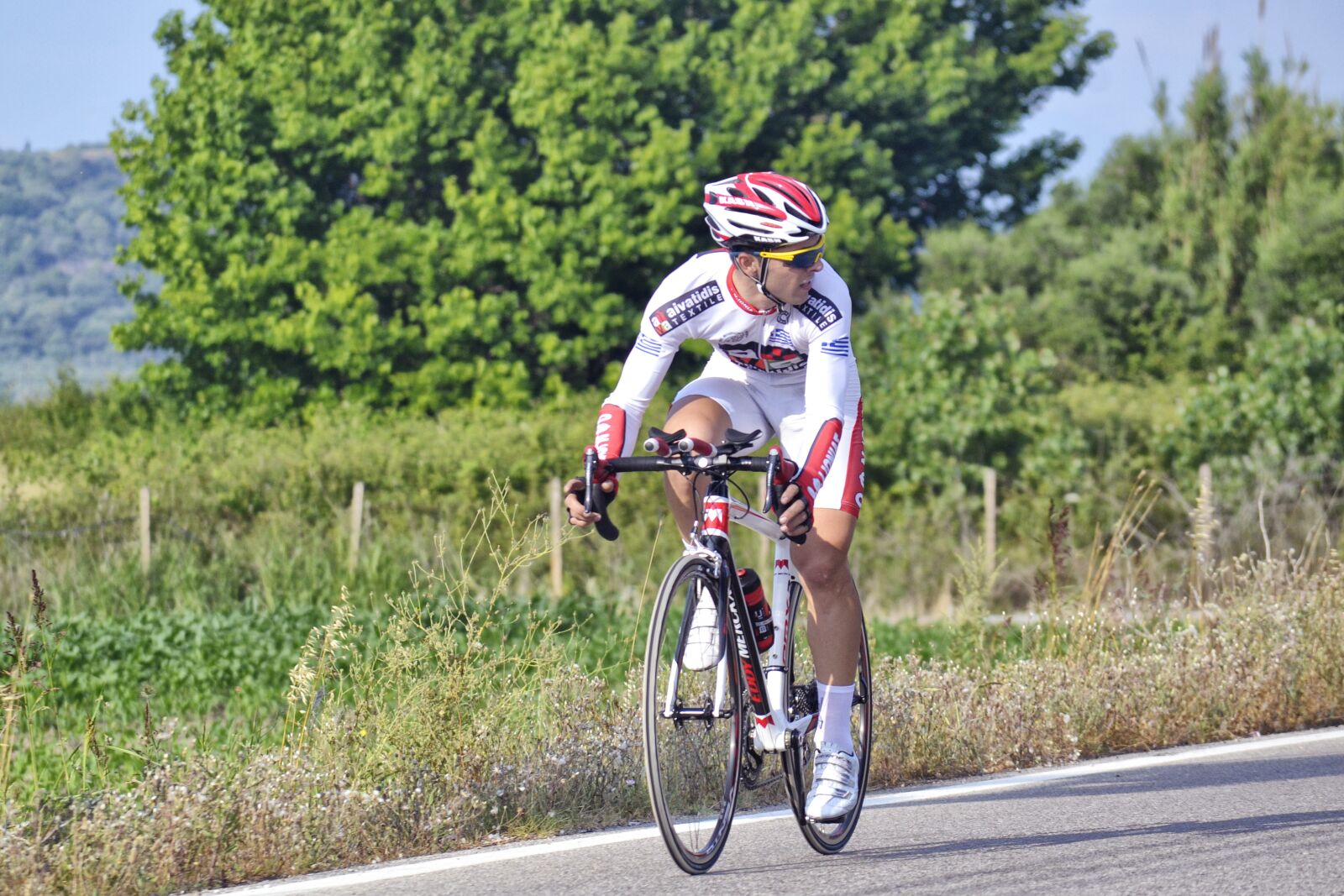 Nikon D3100 sample photo. Cyclist, athlete, competition photography