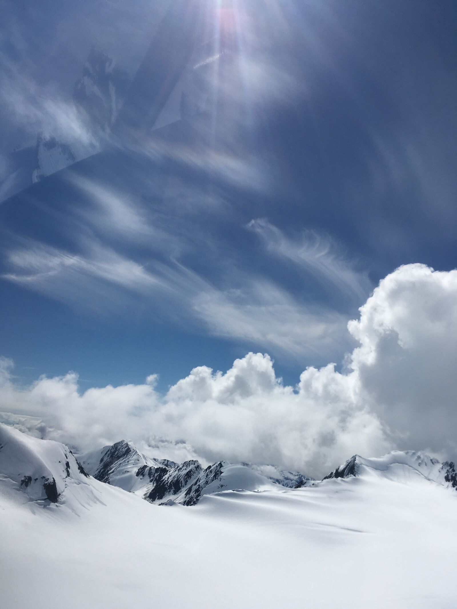 iPhone SE back camera 4.15mm f/2.2 sample photo. Alaska, sky, snow photography