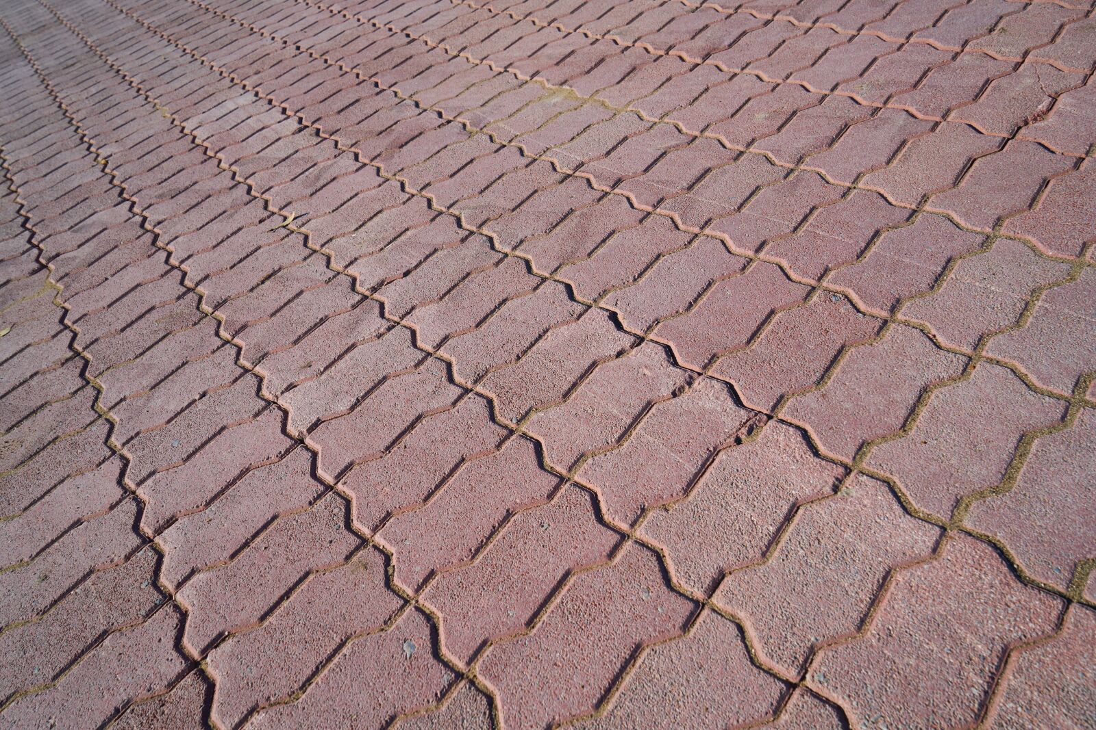 Sony a7R II sample photo. Stone, sidewalk, red photography
