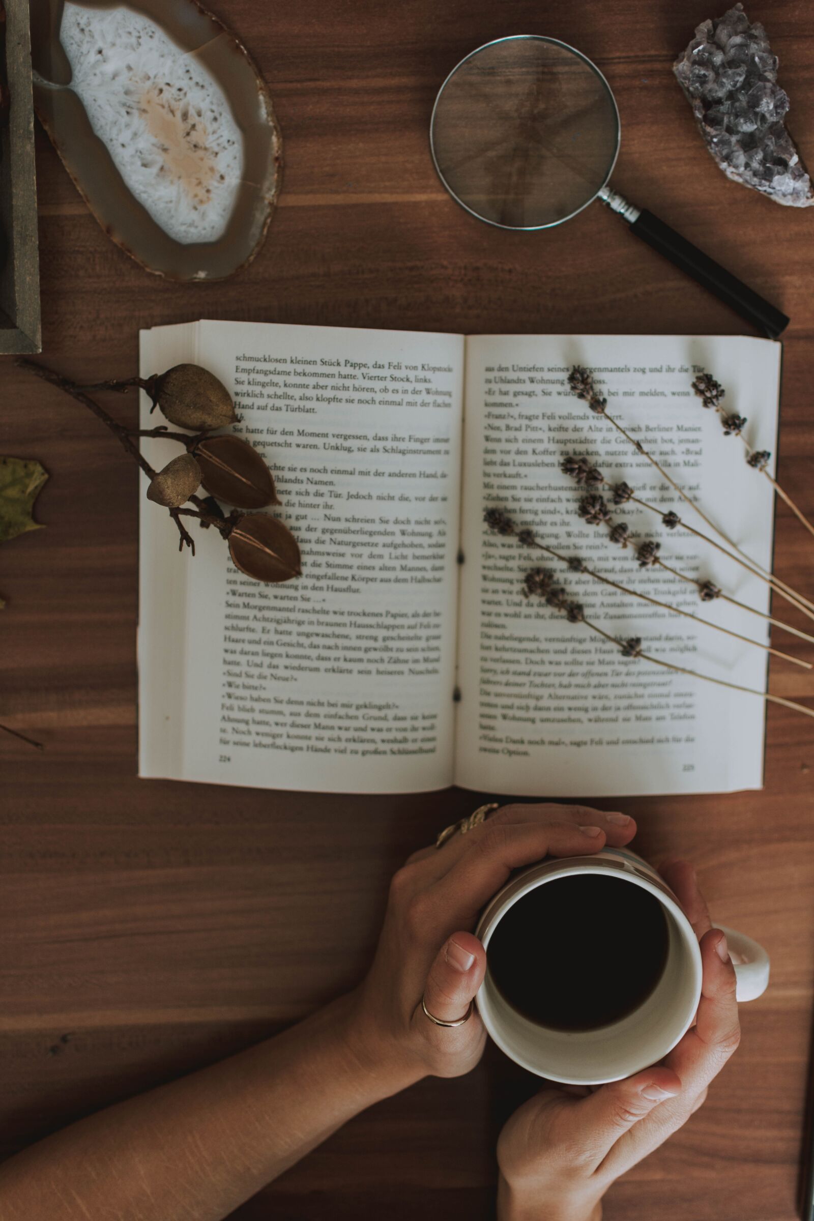Nikon D5200 sample photo. Magnifying glass, stone, book photography