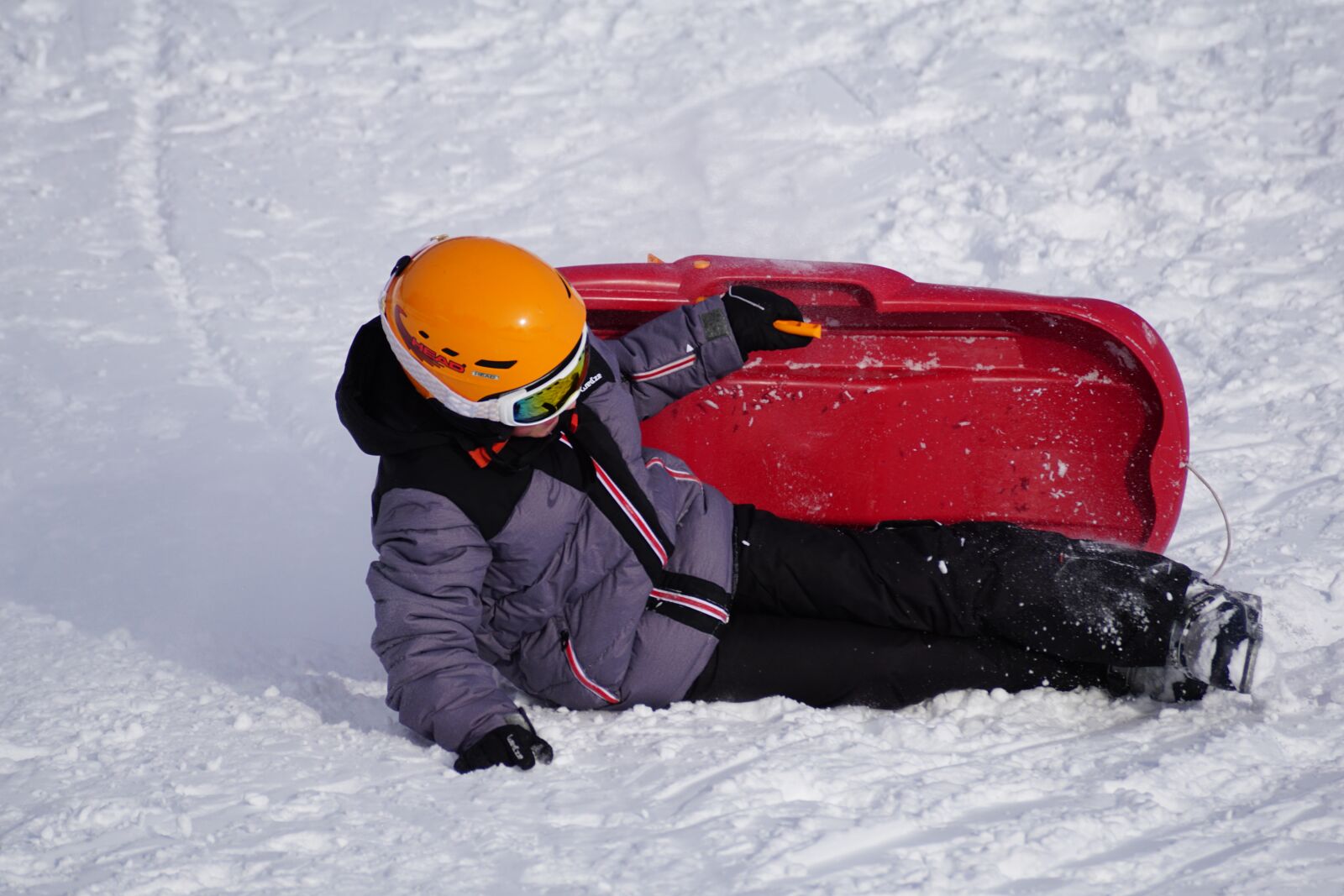 Sony DT 55-300mm F4.5-5.6 SAM sample photo. Safety glasses, skiers, toboggan photography