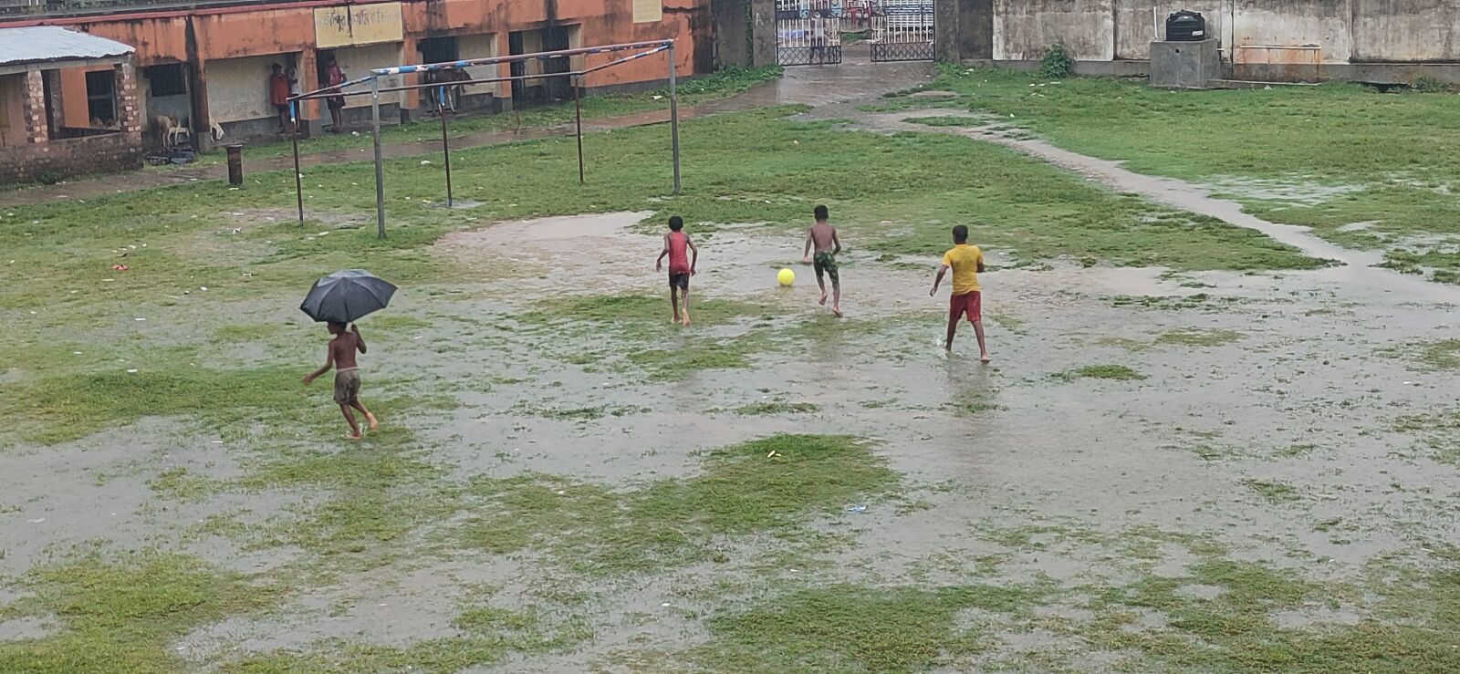 Realme XT sample photo. Football, village, monsoon photography