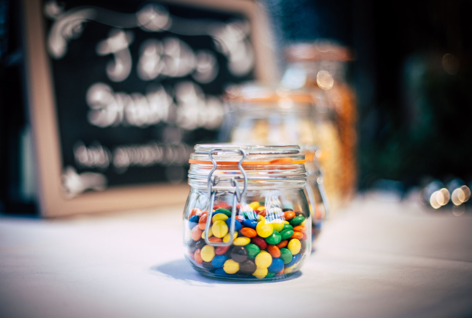 Canon EOS 5D Mark II sample photo. Blur, candies, chocolates, close photography