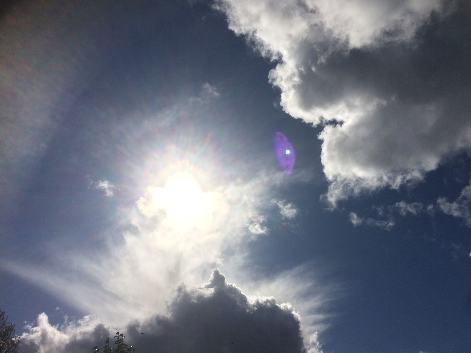 iPhone 5s back camera 4.15mm f/2.2 sample photo. Clouds, sun, burst photography