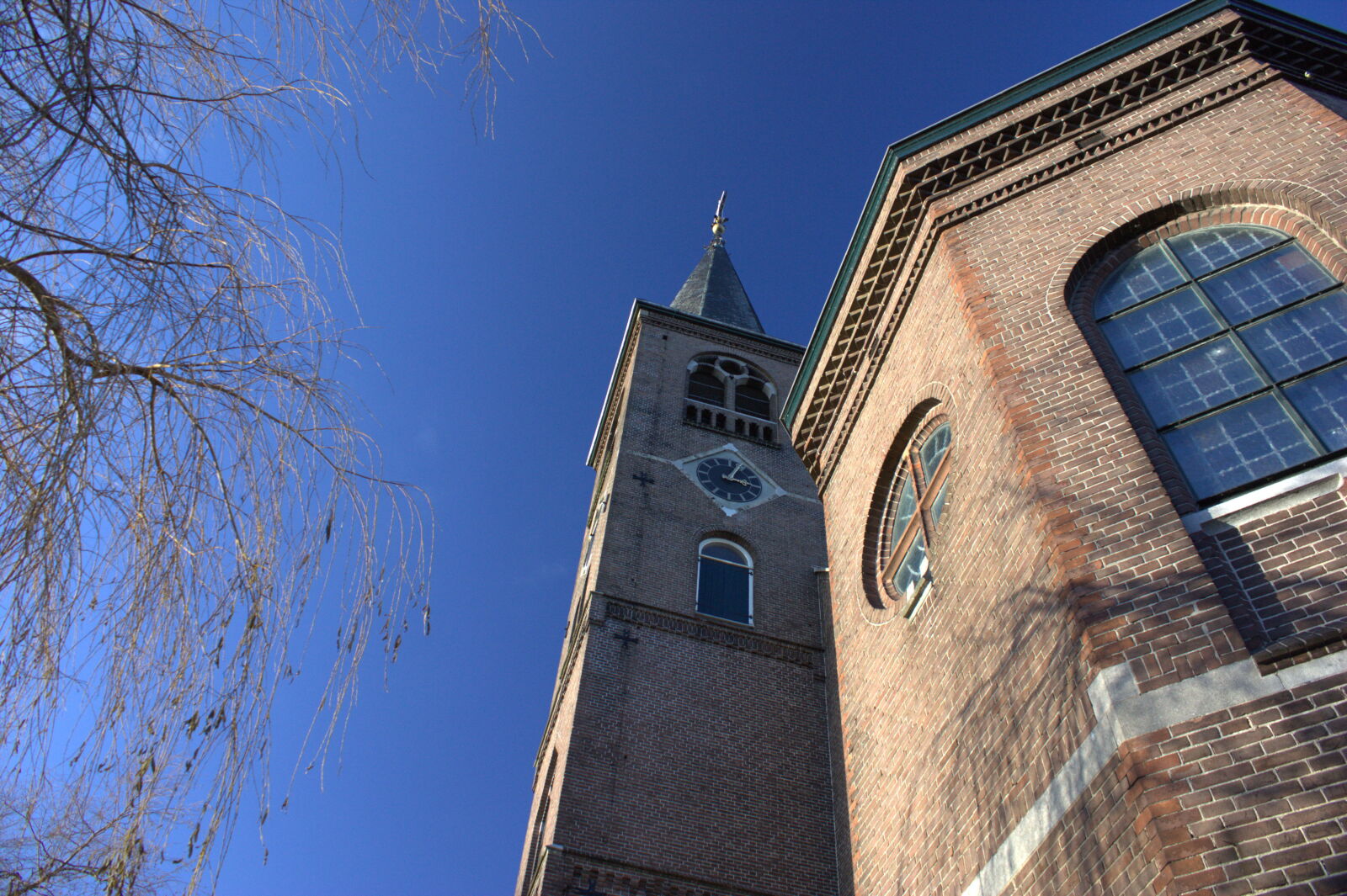 Canon EOS 450D (EOS Rebel XSi / EOS Kiss X2) sample photo. Blue, sky, church, netherlands photography