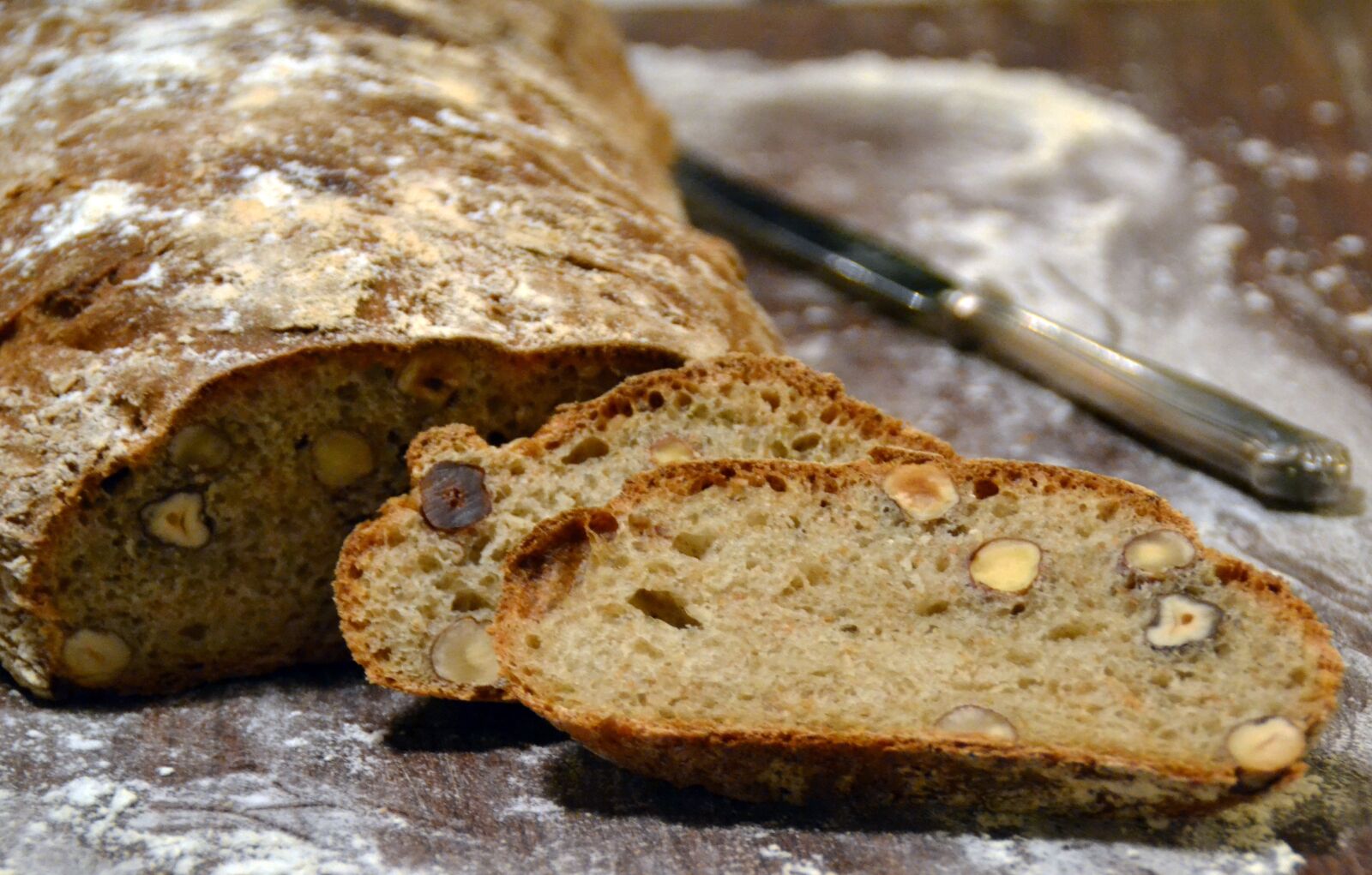 Nikon D3100 sample photo. Bread, hazelnuts, snack photography