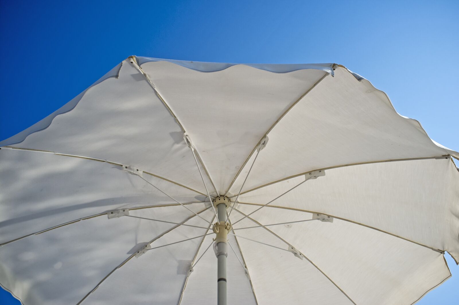 Fujifilm FinePix X100 sample photo. Beach umbrella, particular, white photography
