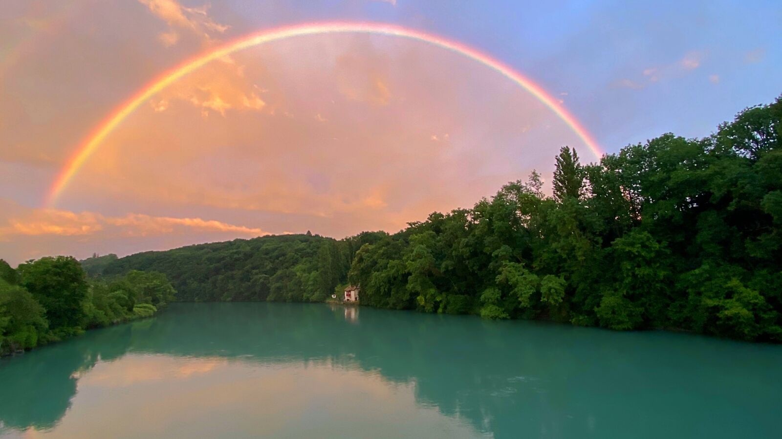 Apple iPhone 11 Pro + iPhone 11 Pro back triple camera 1.54mm f/2.4 sample photo. Rainbow, water, river photography