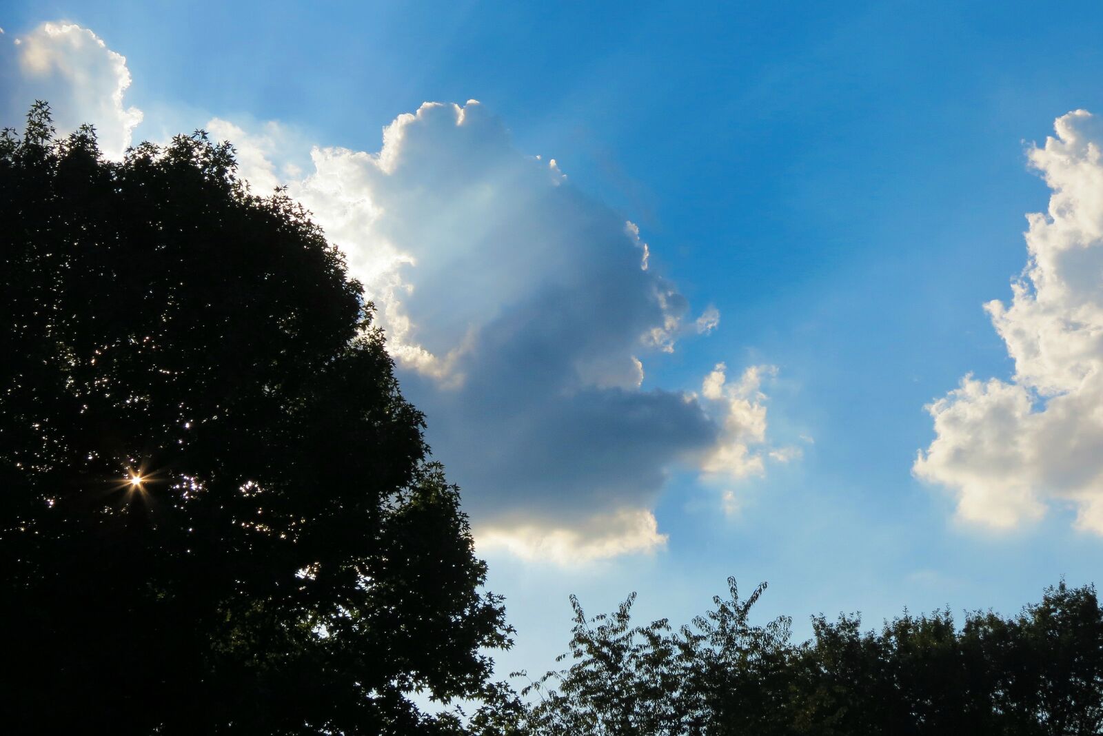 Canon PowerShot SX40 HS sample photo. Sunshine, clouds, sun photography