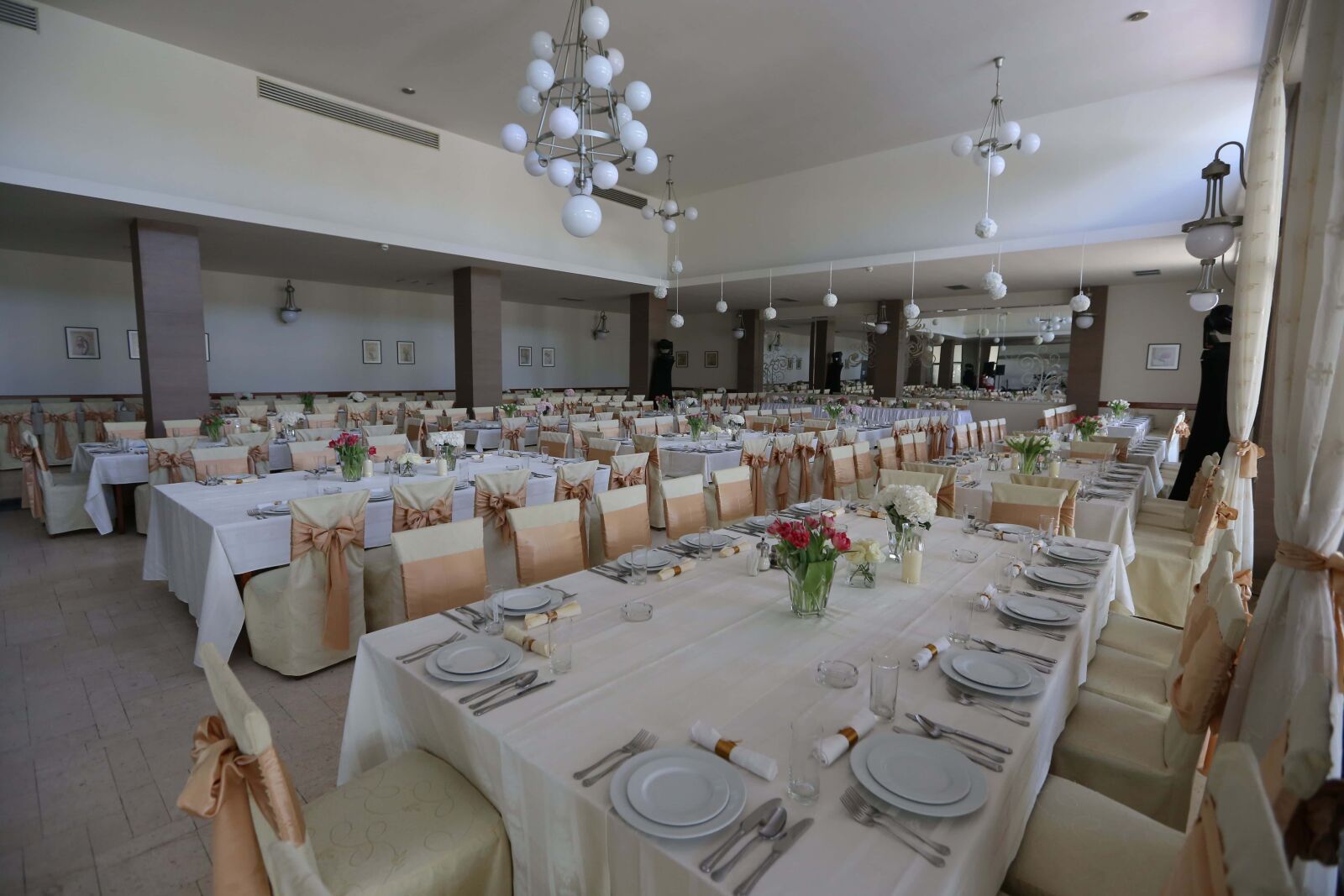 Canon EF 16-35mm F2.8L II USM sample photo. Arrangement, restaurant, wedding, chairs photography