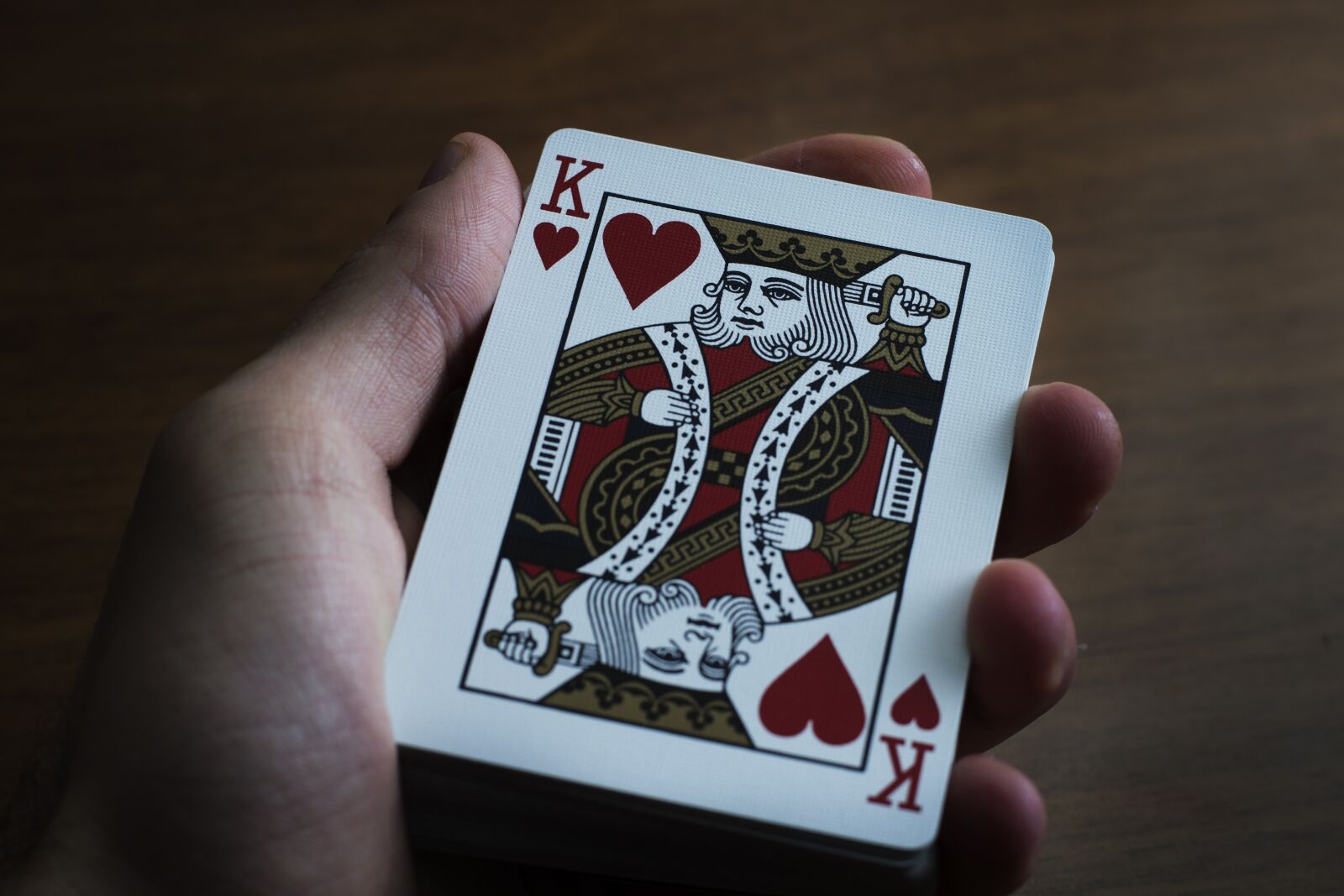 Nikon D3100 sample photo. Hand, playing cards, paper photography