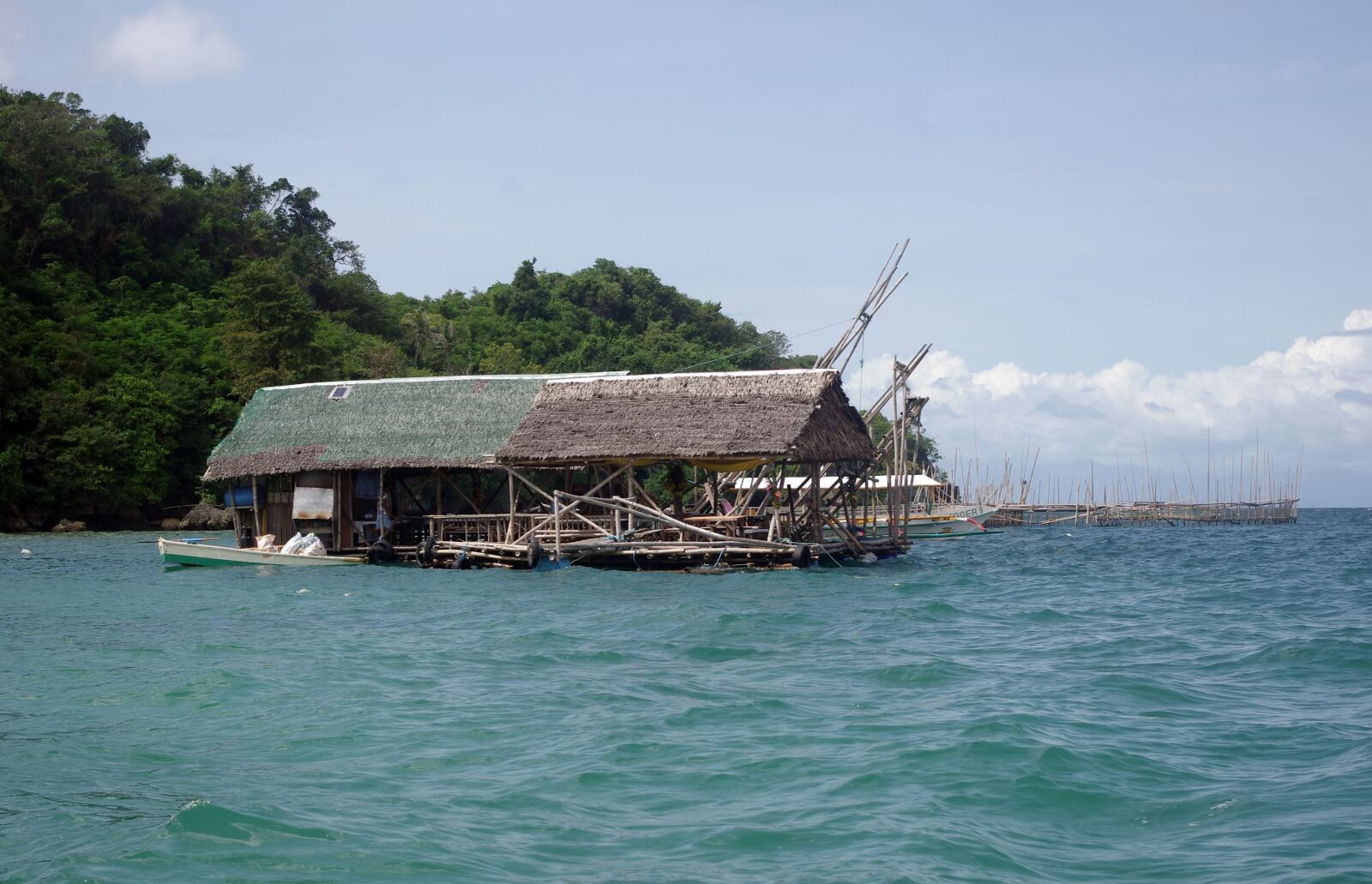 Pentax K-r sample photo. Floating restaurant, sea, water photography