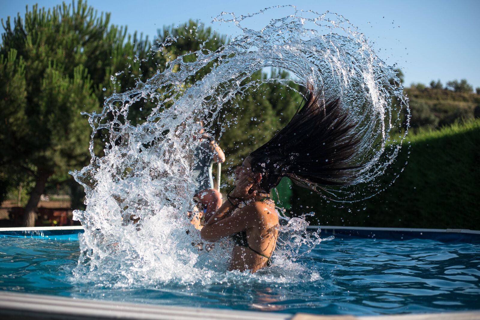 Canon EF 50mm F1.8 STM sample photo. Water, hair, movement photography