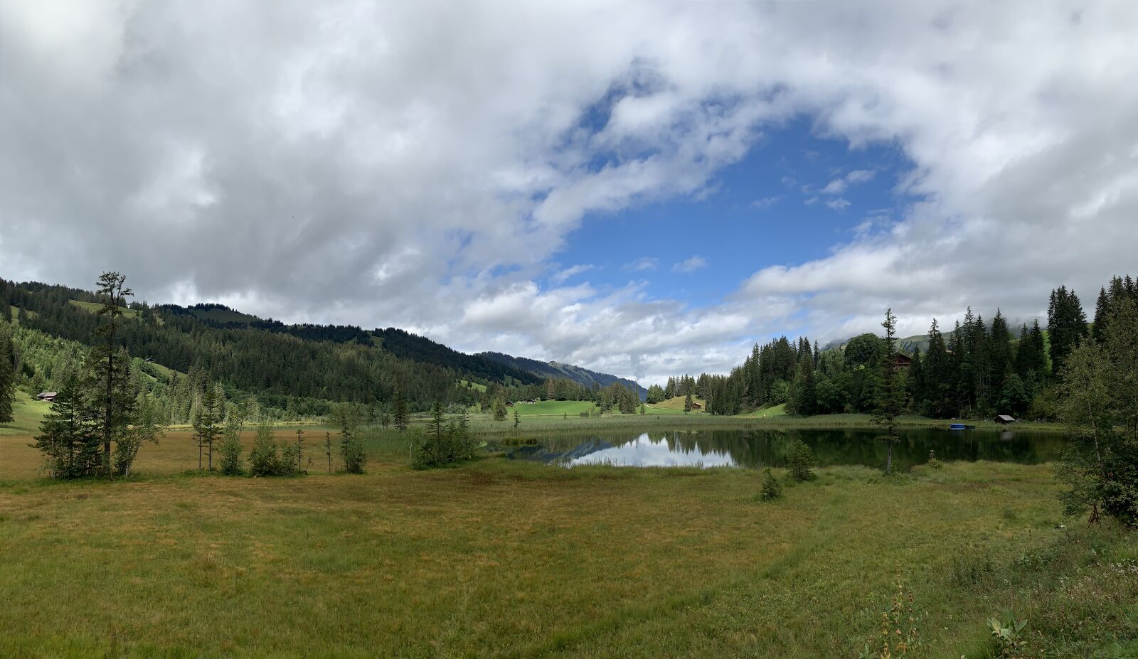Apple iPhone XS + iPhone XS back camera 4.25mm f/1.8 sample photo. Gstaad, lake lauenen, lake photography