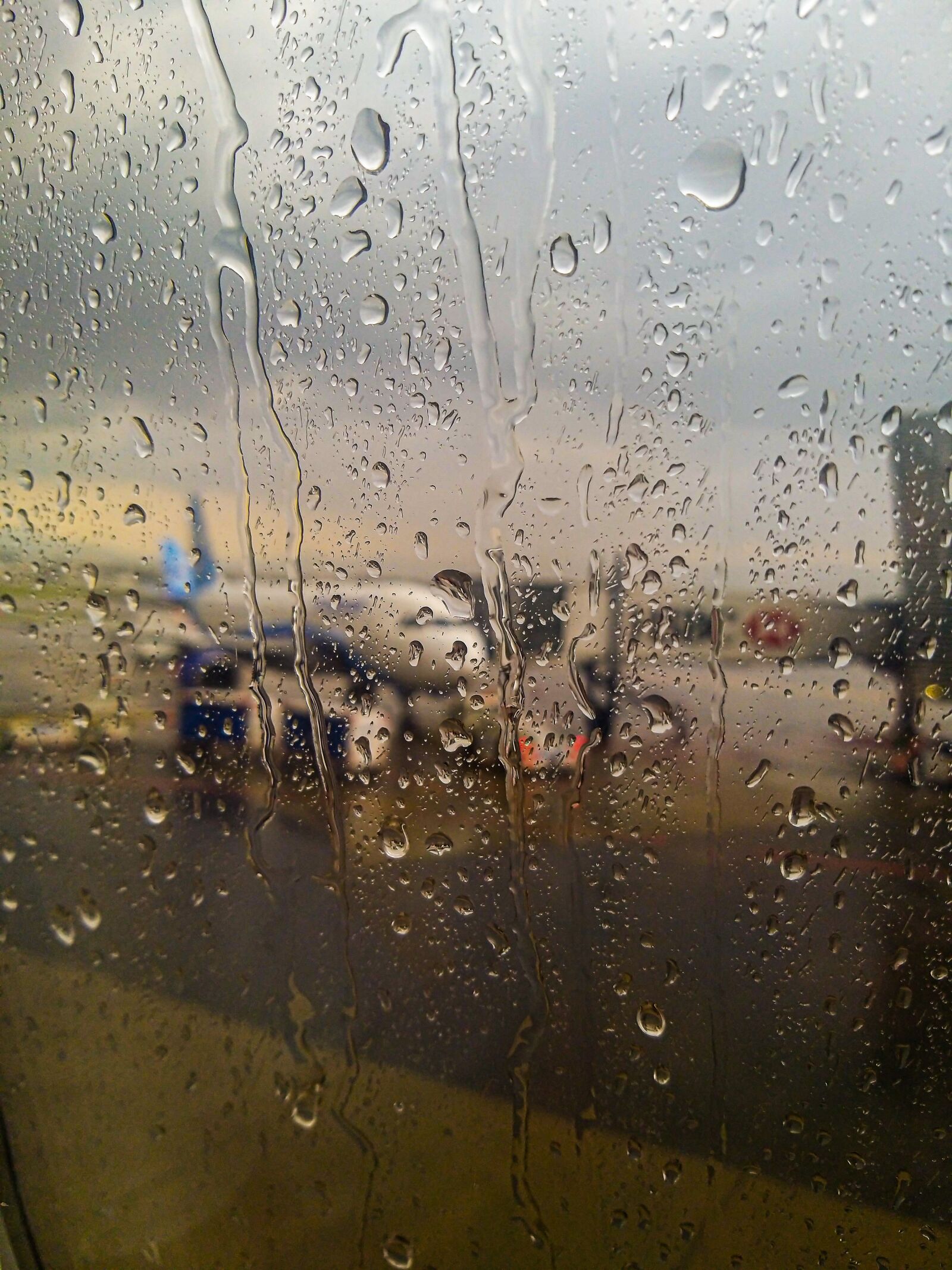 Samsung Galaxy A9 (2018) sample photo. Rain, plane, sky photography