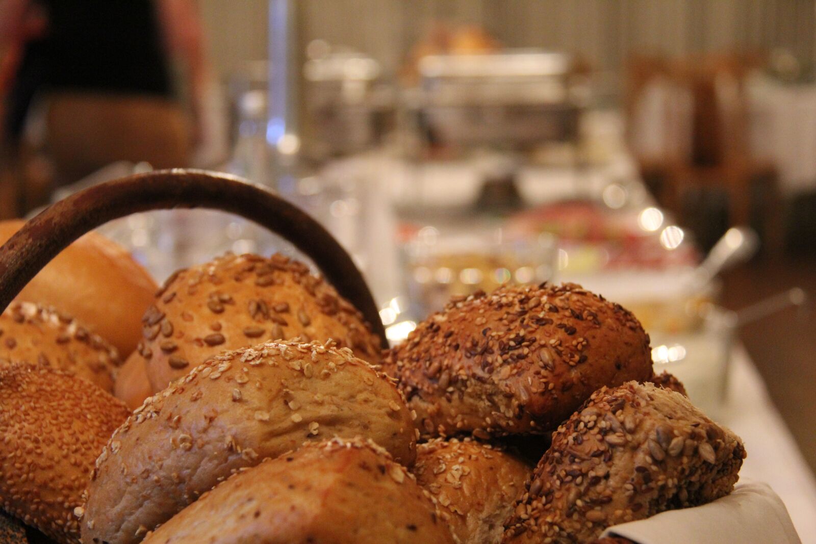 Canon EF-S 18-200mm F3.5-5.6 IS sample photo. Bread basket, breakfast buffet photography