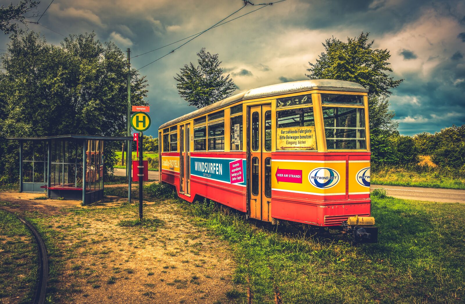 Sony a7 II + Sony FE 28-70mm F3.5-5.6 OSS sample photo. Tram, stop, transport photography