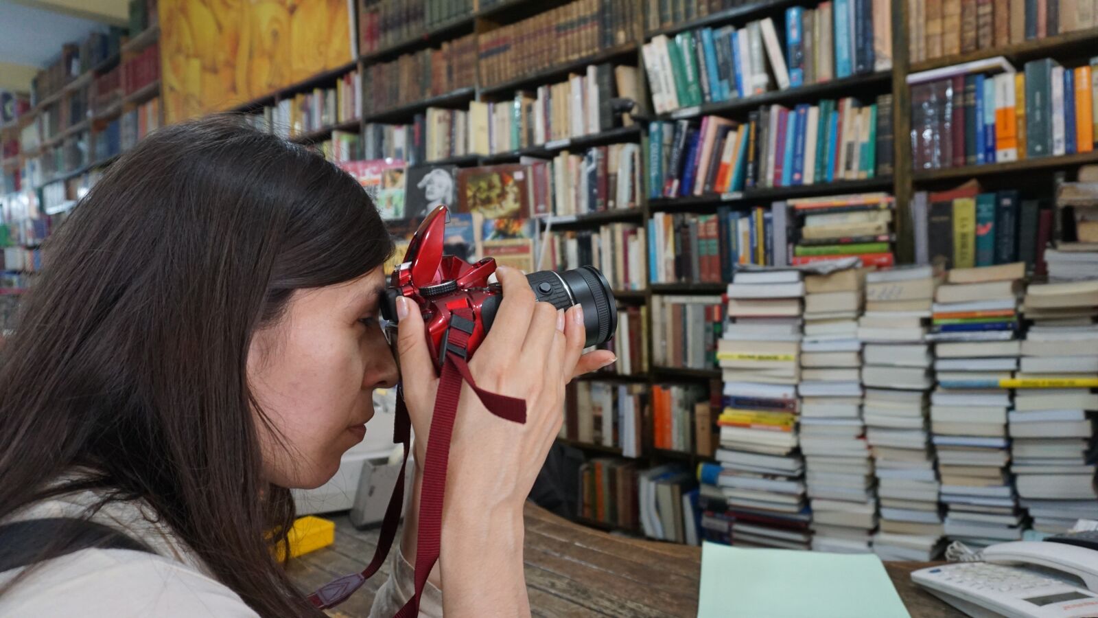 Sony E 16-50mm F3.5-5.6 PZ OSS sample photo. Library, shelving, people photography