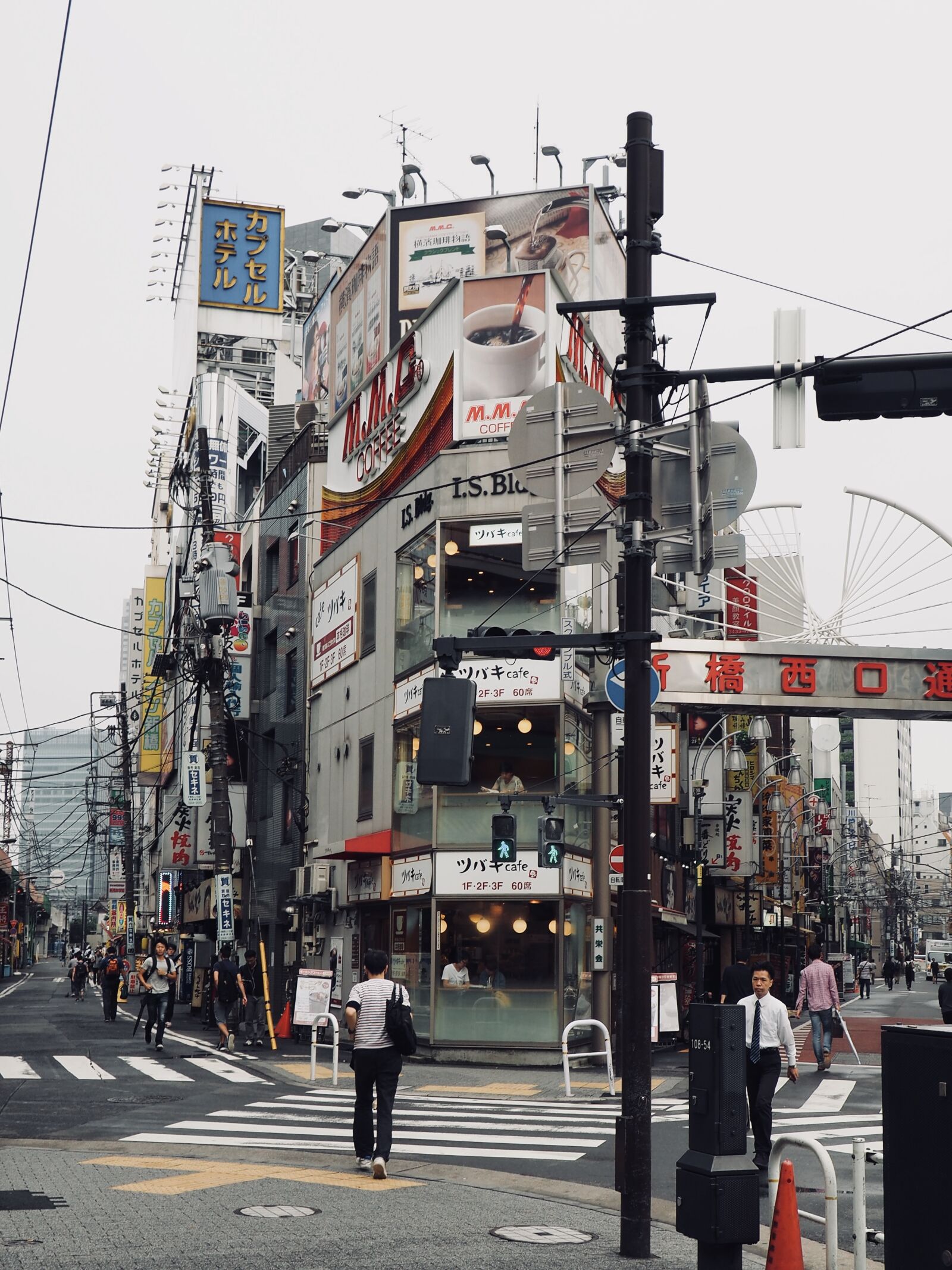 Olympus OM-D E-M10 II sample photo. Two, men, crossing, pedestrian photography