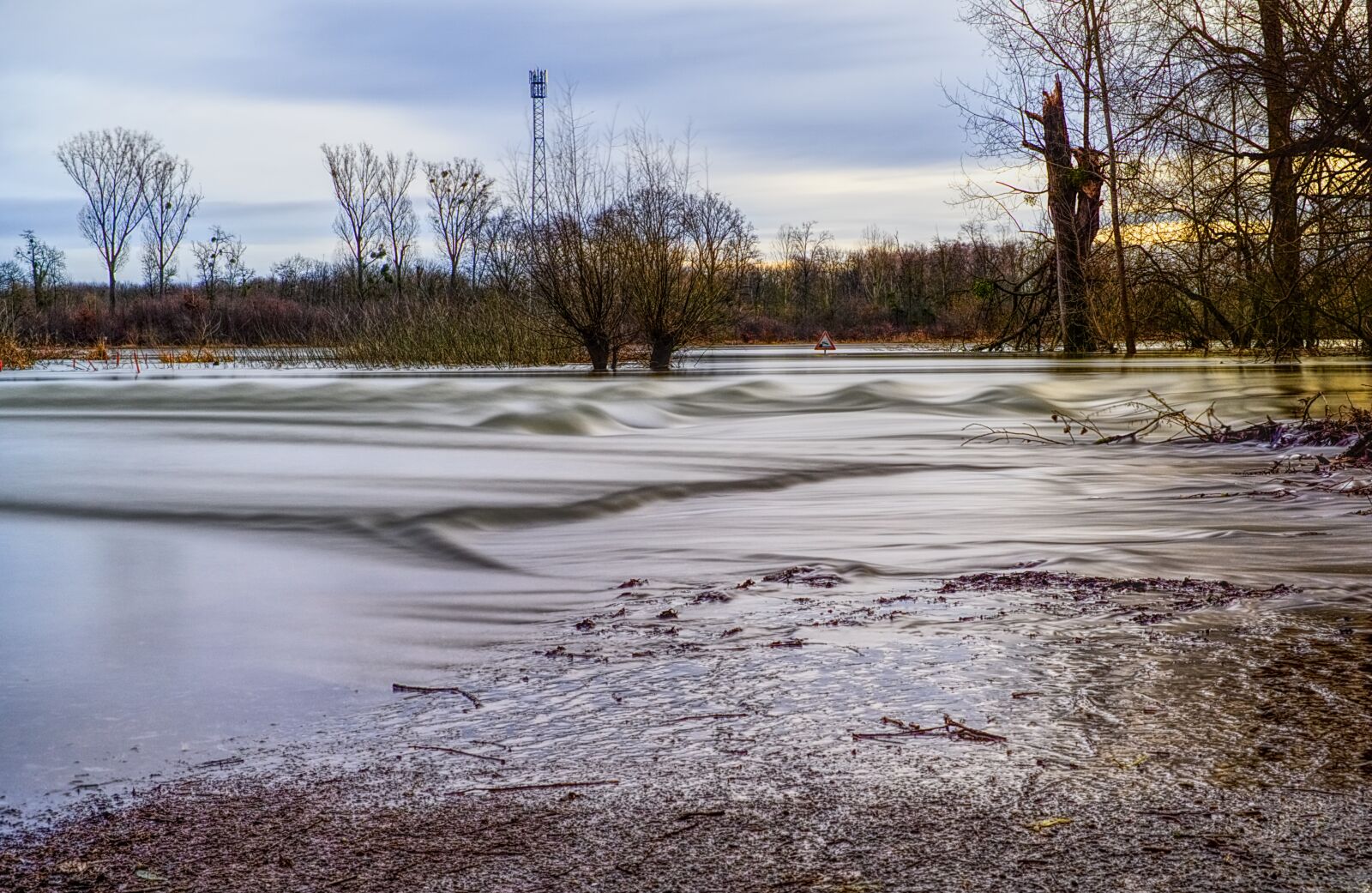 Sony a6000 + Sony E 35mm F1.8 OSS sample photo. High water, flow, river photography