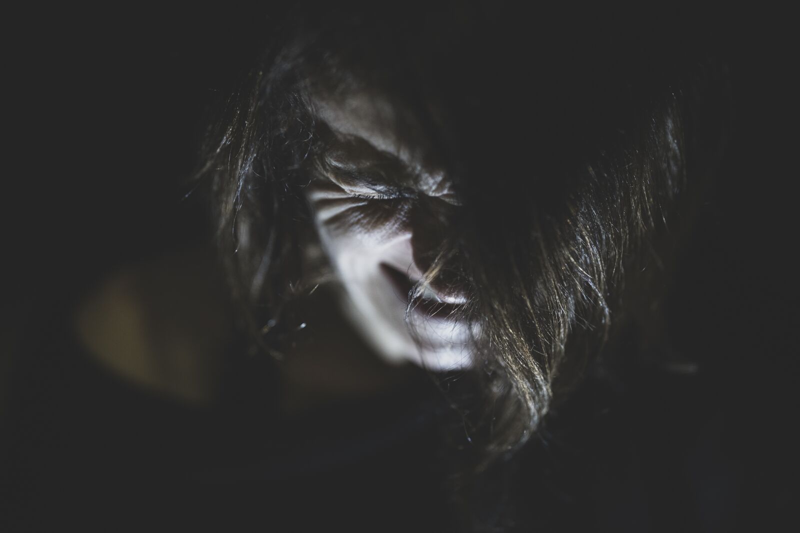 Canon RF 85mm F1.2L USM sample photo. Pain, endure, dark photography