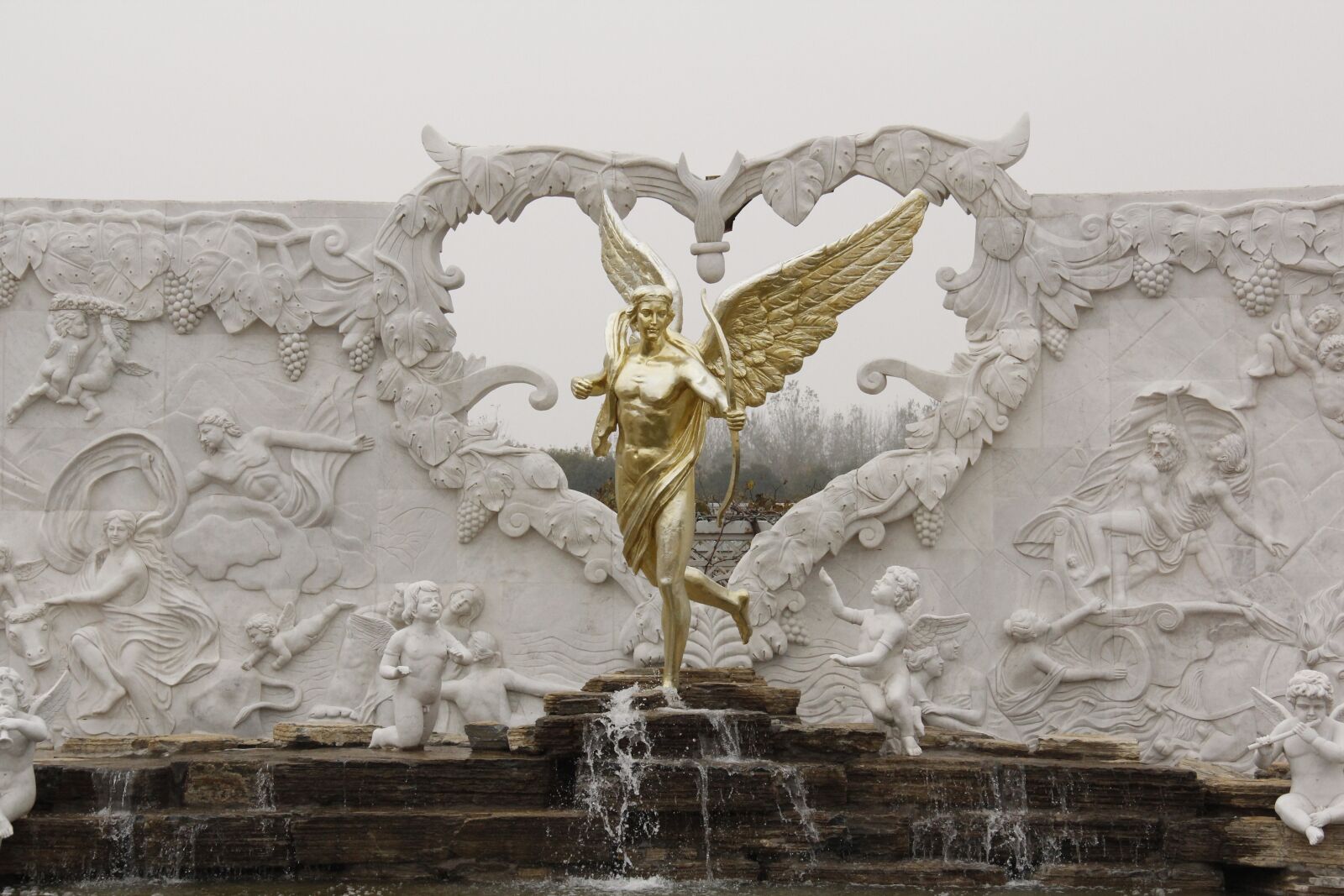 Canon EOS 60D sample photo. Sculpture, angel, gold photography