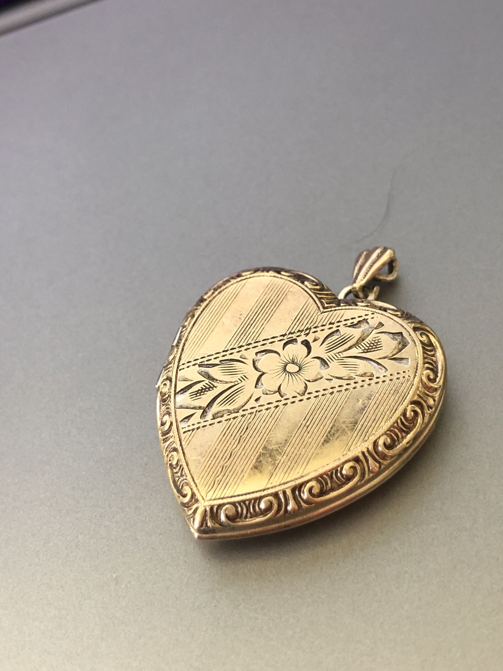 iPhone 8 Plus back dual camera 3.99mm f/1.8 sample photo. Locket, heart, jewellery photography