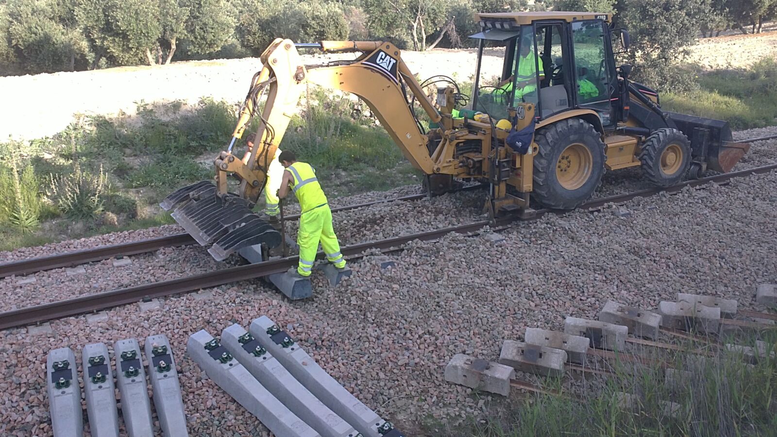 Sony Ericsson U5i sample photo. Train, sleepers, excavator photography