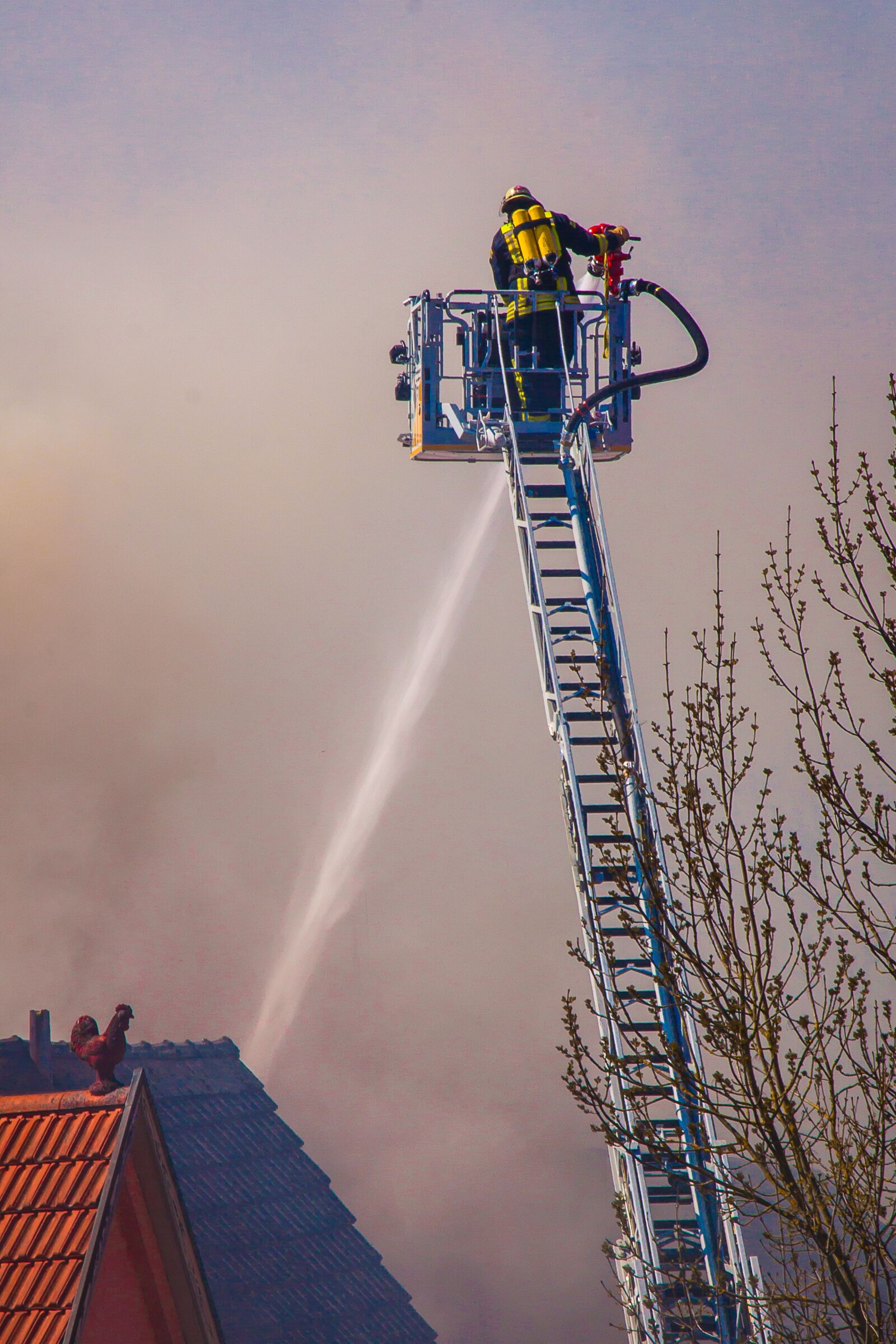 Canon EOS 50D + Canon EF 24-105mm F4L IS USM sample photo. Smoke, fire, brand photography