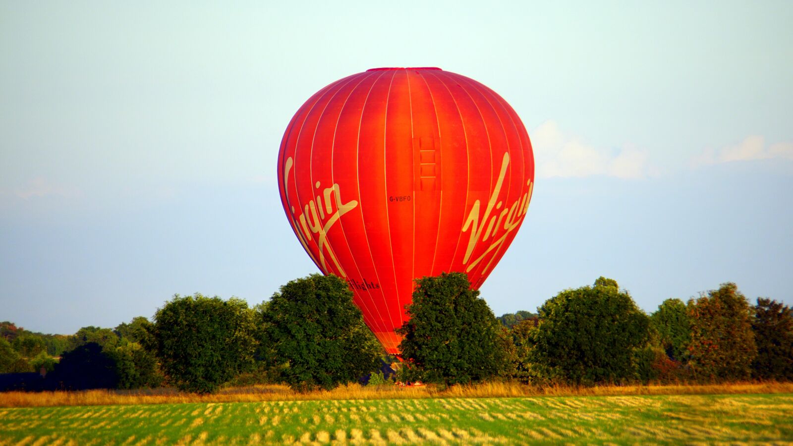 Sony E 55-210mm F4.5-6.3 OSS sample photo. Red, balloon, sky photography