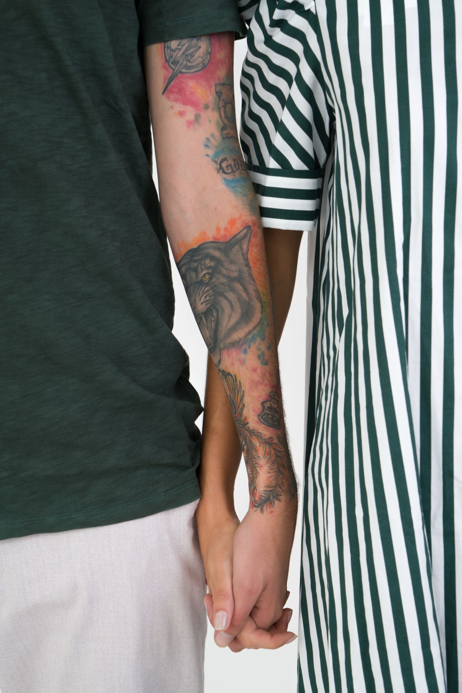 Sony a7R II + Sony Vario Tessar T* FE 24-70mm F4 ZA OSS sample photo. Holding hands, tattoos, couple photography
