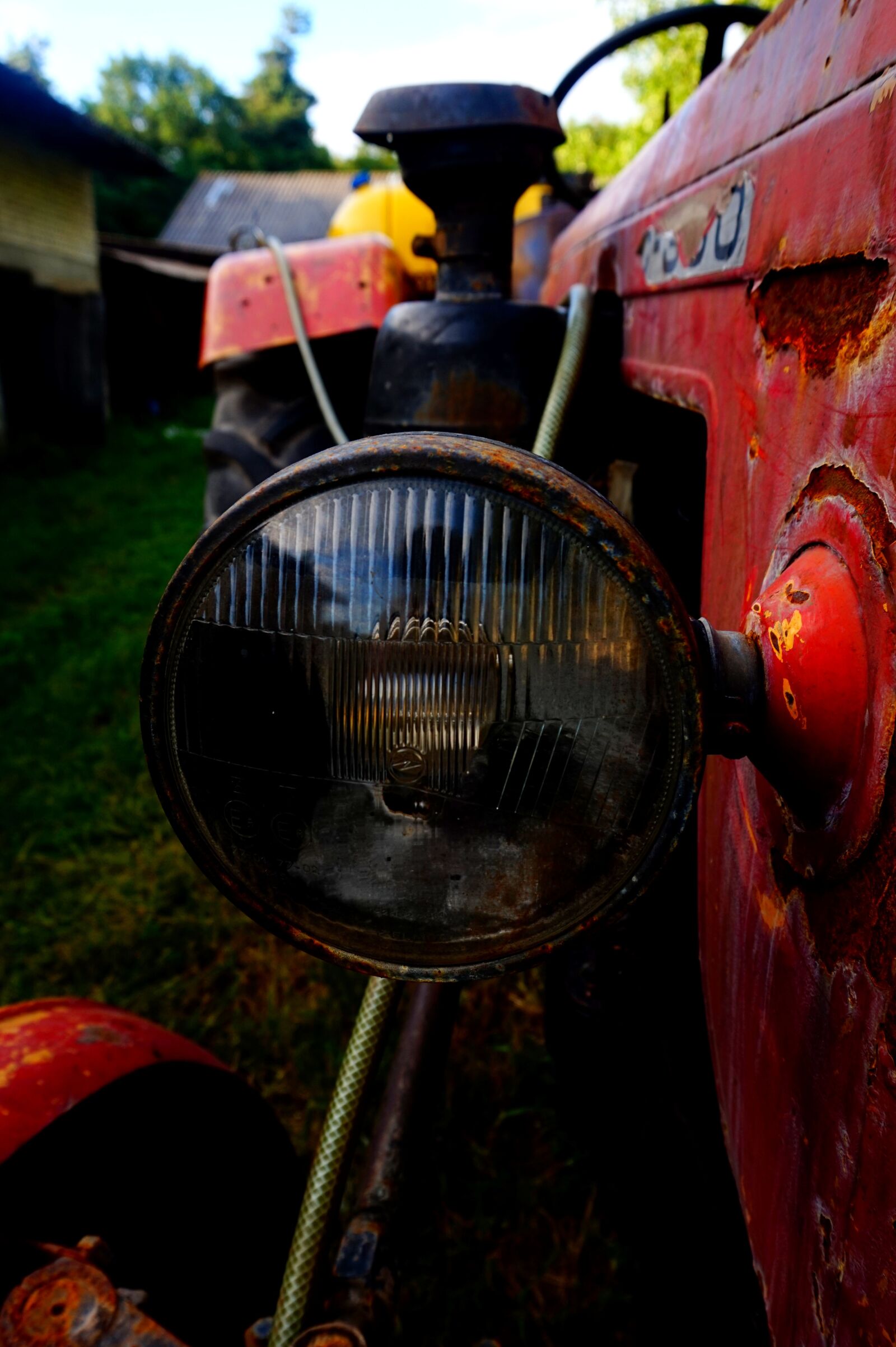 Sony Alpha a5000 (ILCE 5000) sample photo. Tractor, light, closeup photography