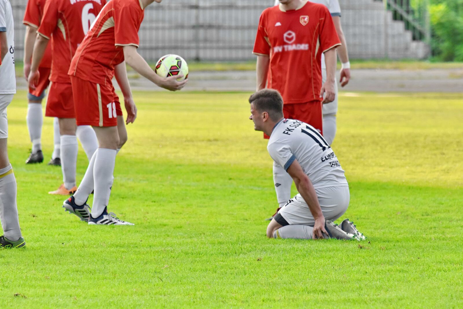 Nikon D5500 sample photo. Championship, football player, injury photography