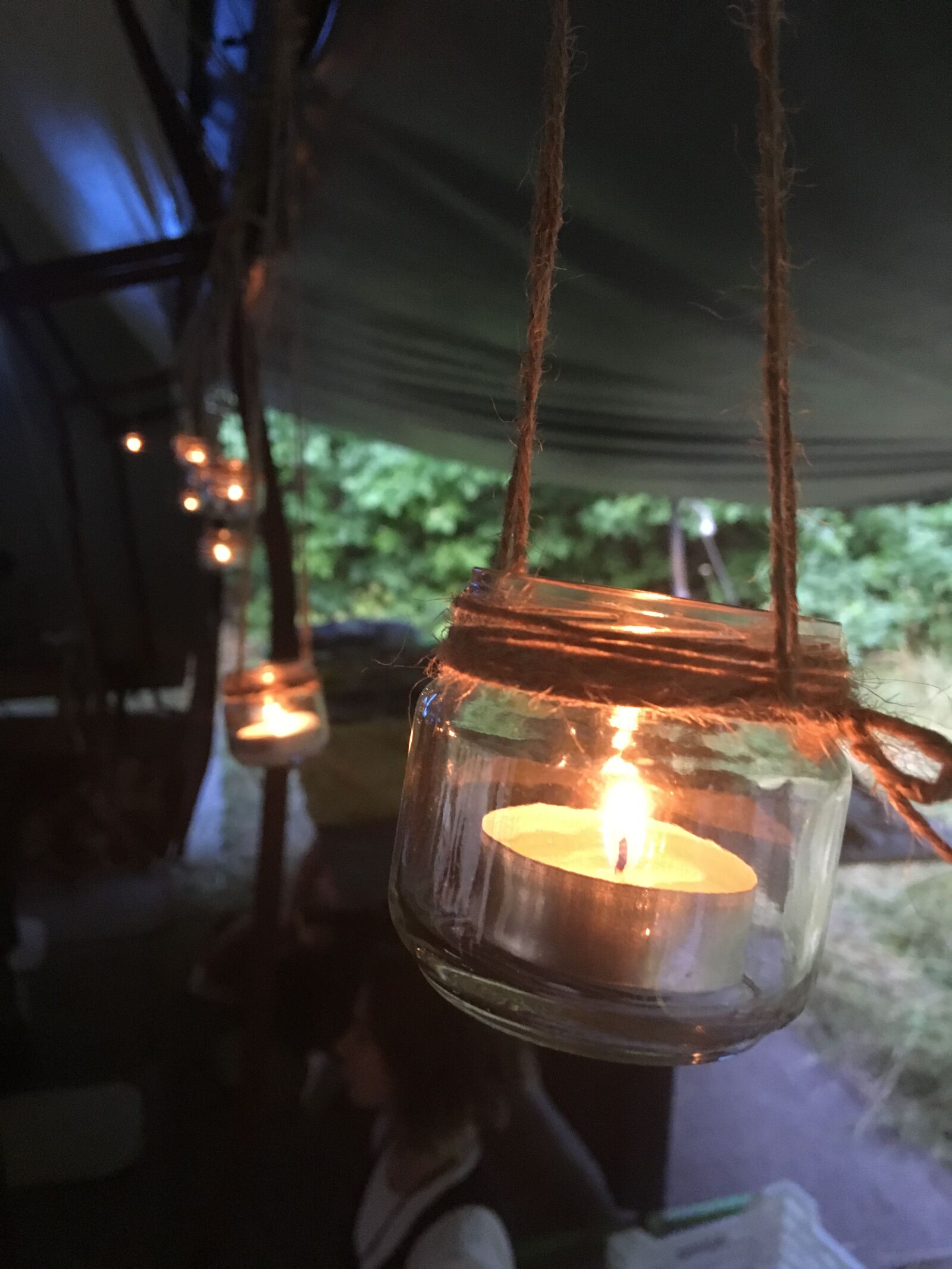 iPhone SE back camera 4.15mm f/2.2 sample photo. Candle, light, evening photography