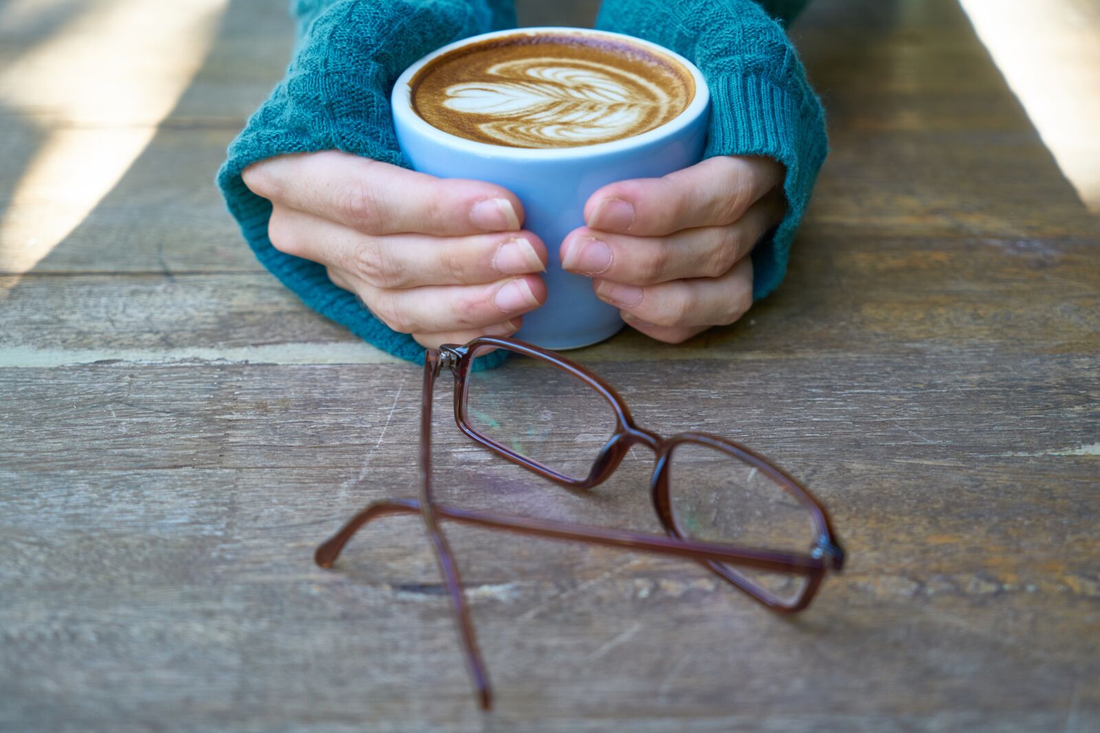Sony a7R II sample photo. Coffee, el, eyewear photography