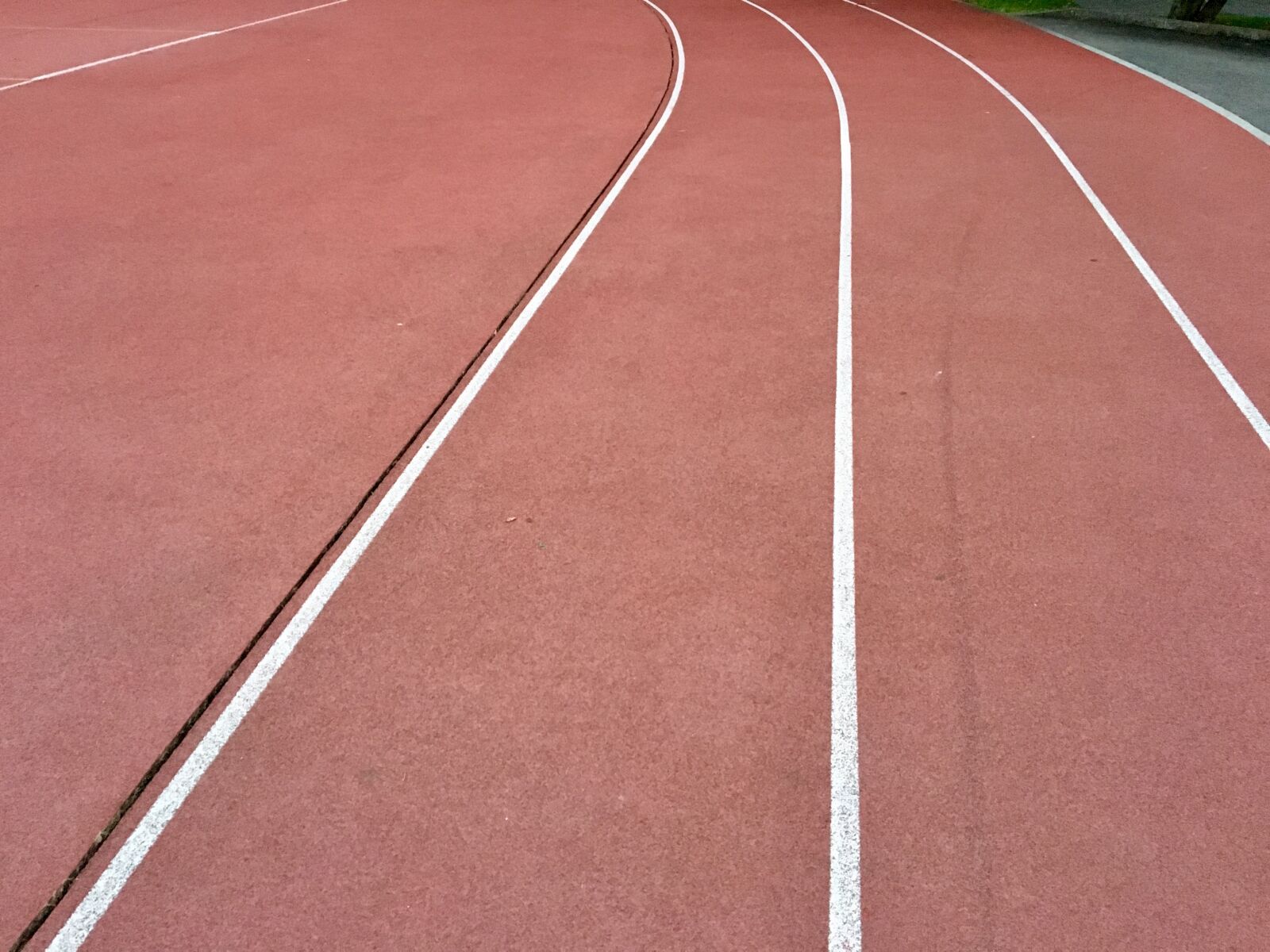 Apple iPhone 6s sample photo. Plastic track, tartan track photography