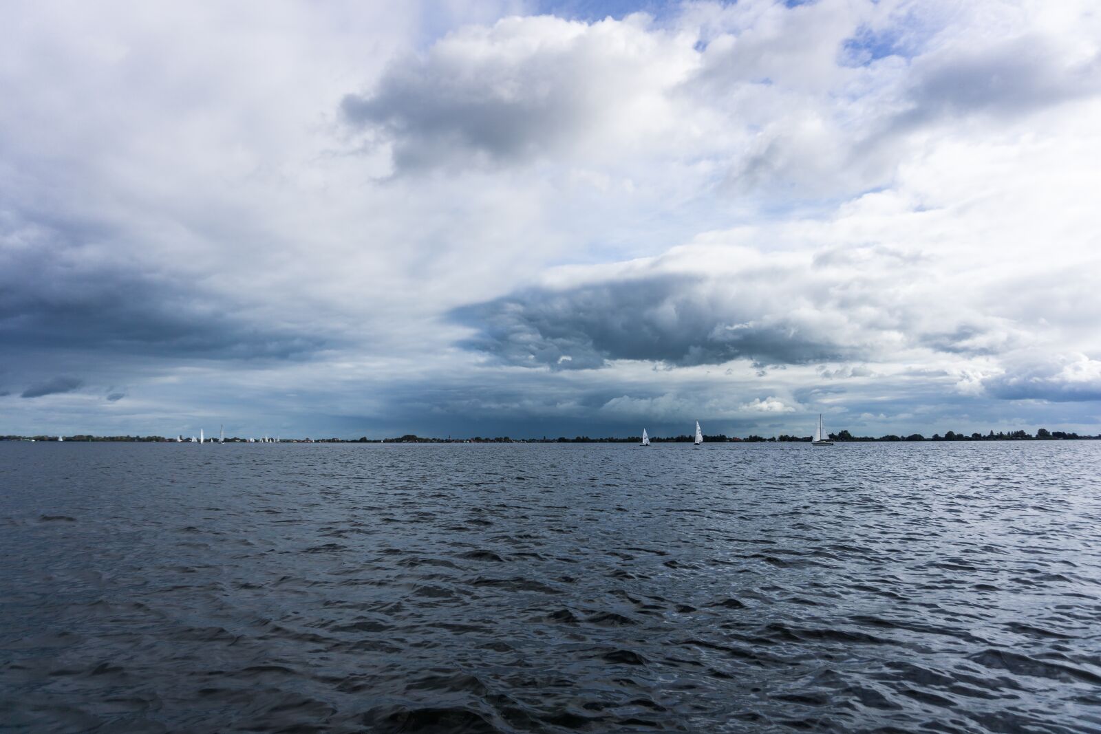 Sony a6000 sample photo. Clouds, water, sailing photography