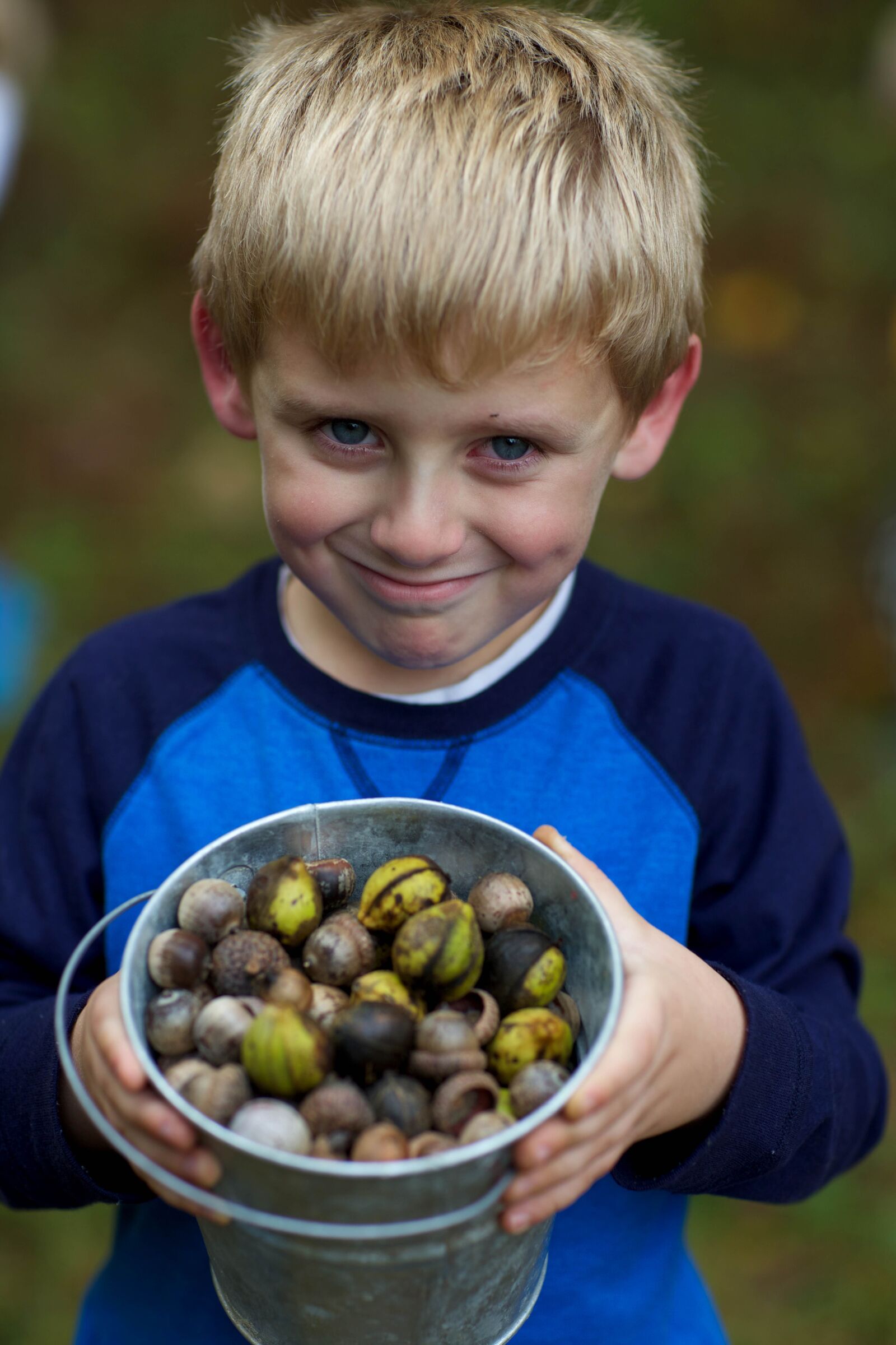 Canon EOS 5D Mark III sample photo. Young boy, proudly, displays photography