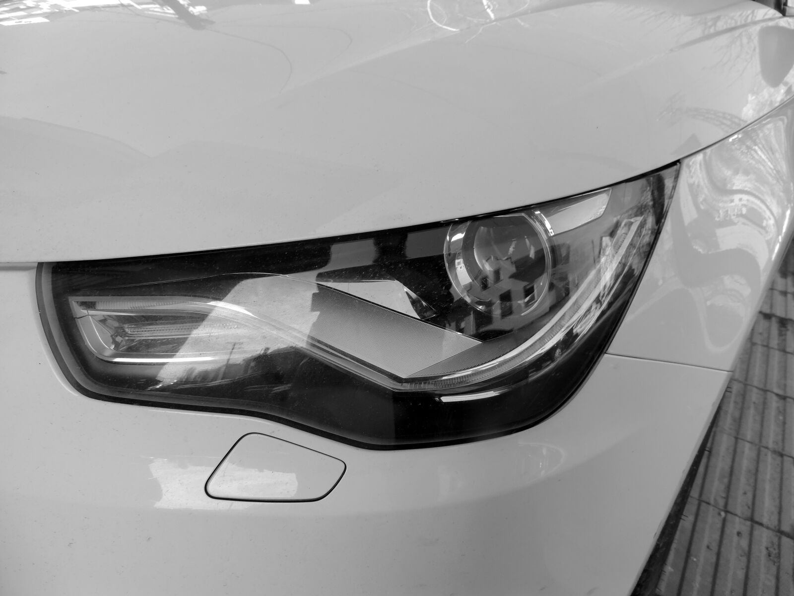 Nikon Coolpix P520 sample photo. Black and white, headlight photography