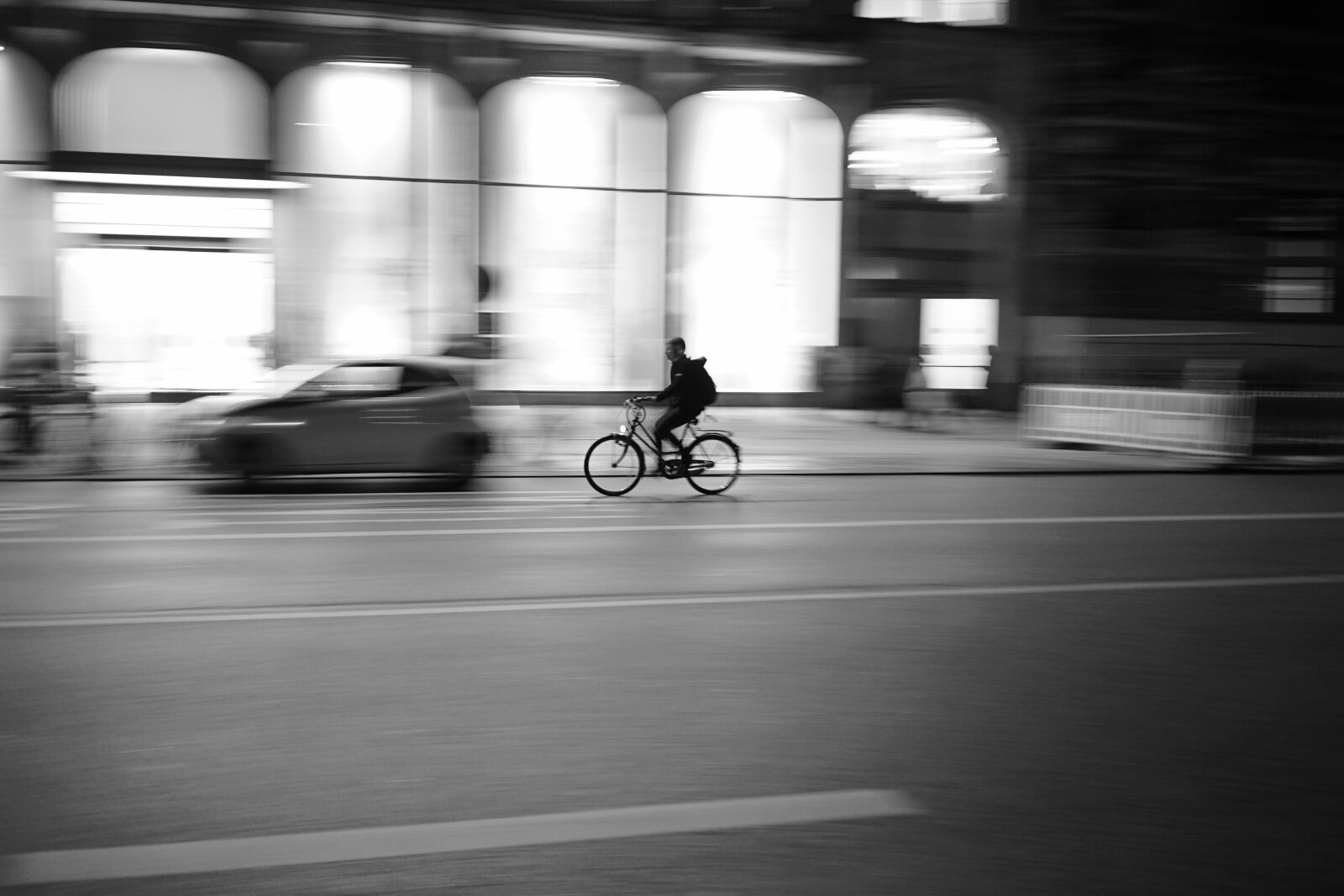 Samyang AF 35mm F2.8 FE sample photo. Cyclists, city, street photography photography