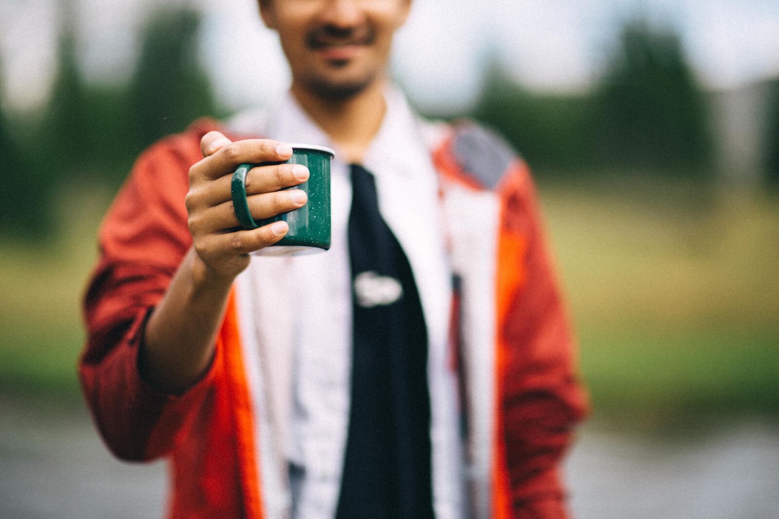 Canon EF 85mm F1.2L II USM sample photo. Blur, cup, hand photography