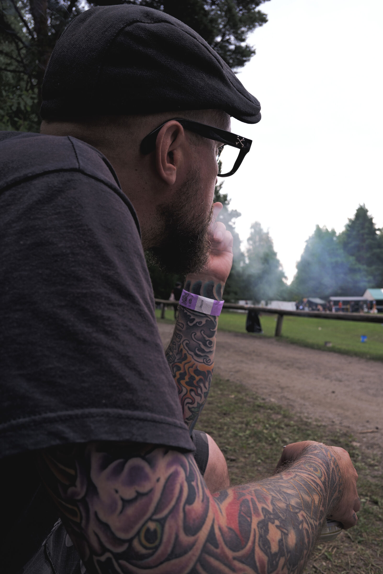 Panasonic Lumix DC-S9 sample photo. Pondering festival goer photography