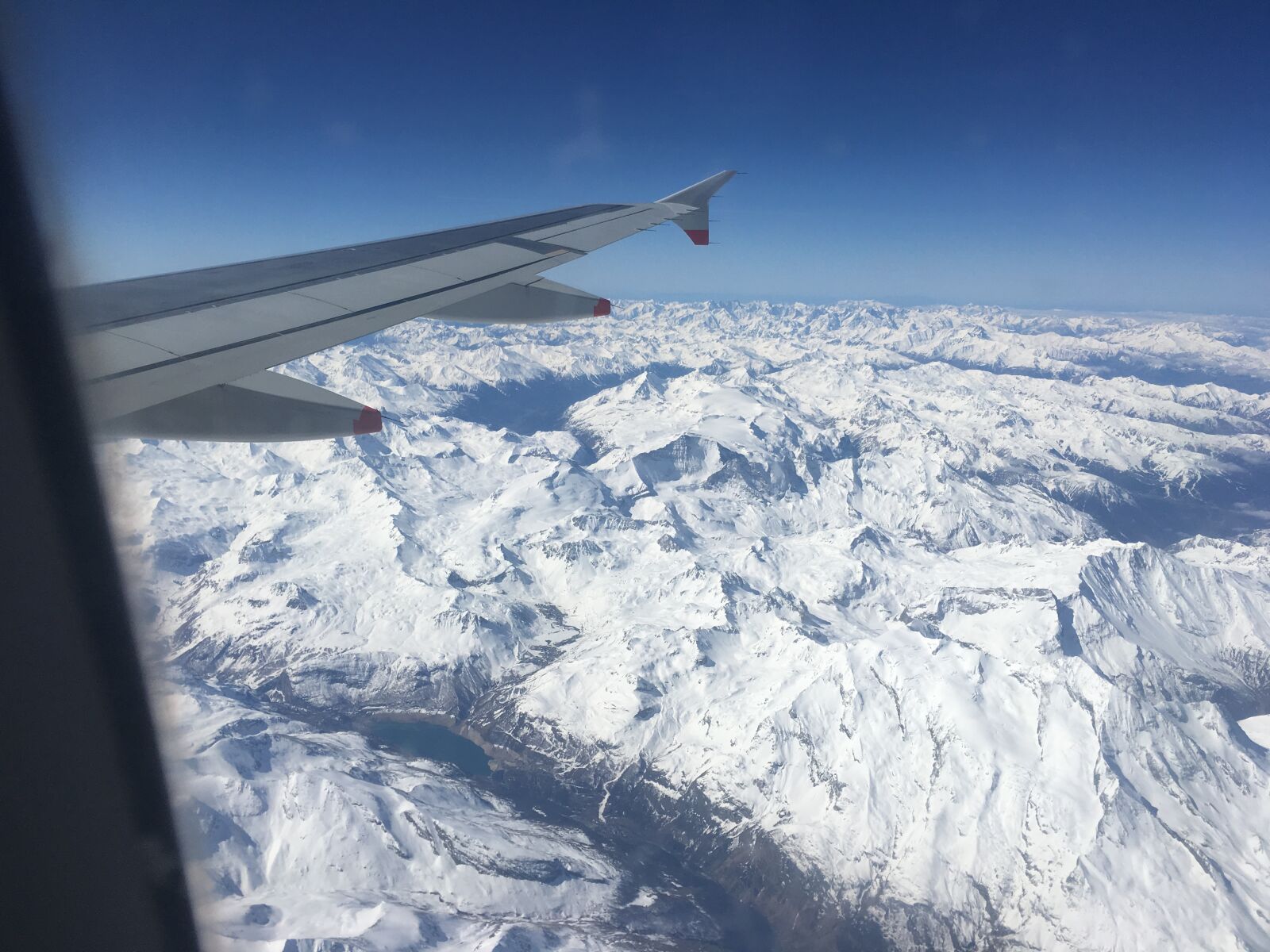 iPhone 6s back camera 4.15mm f/2.2 sample photo. Italian, alps, plane photography