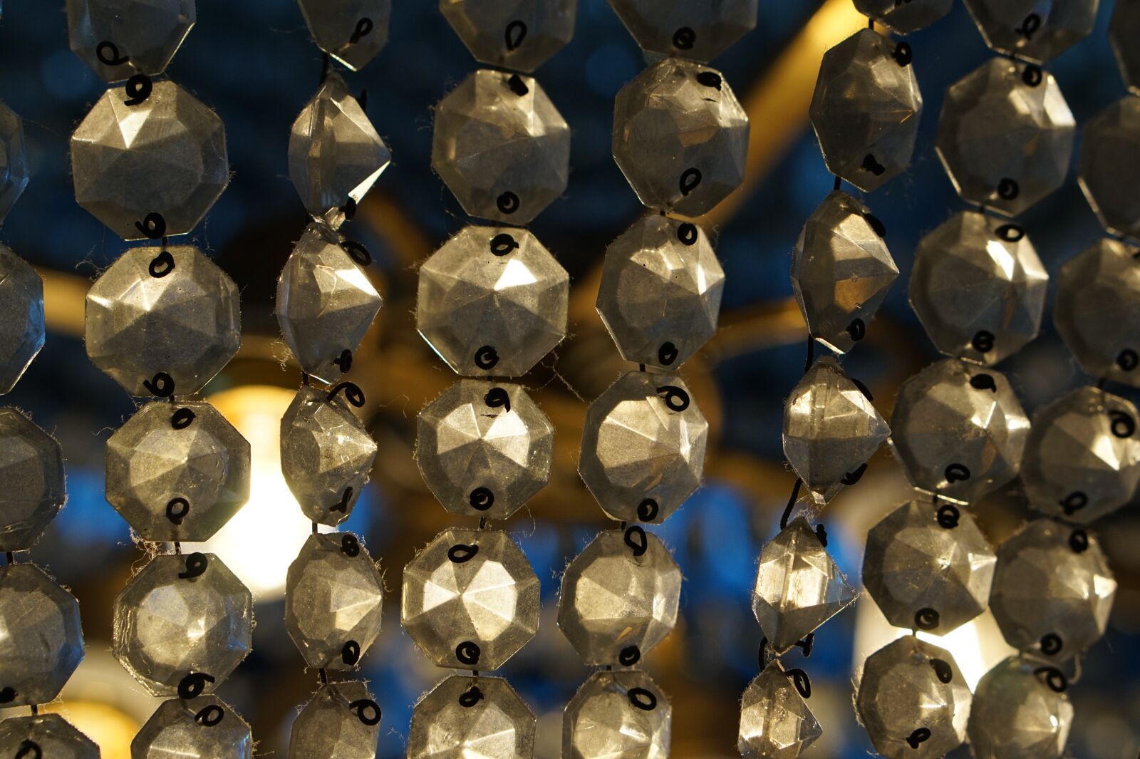 Sony Alpha a5000 (ILCE 5000) + E 50mm F1.8 OSS sample photo. Chandelier, light, abstract photography