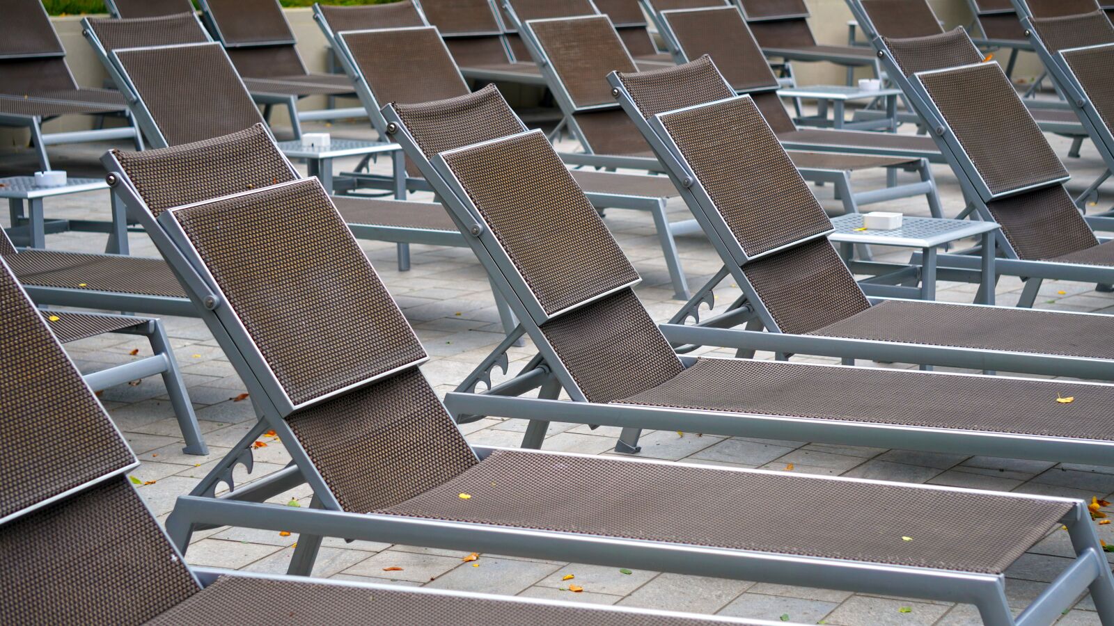 Sony E 55-210mm F4.5-6.3 OSS sample photo. Sun loungers, pool, vacations photography