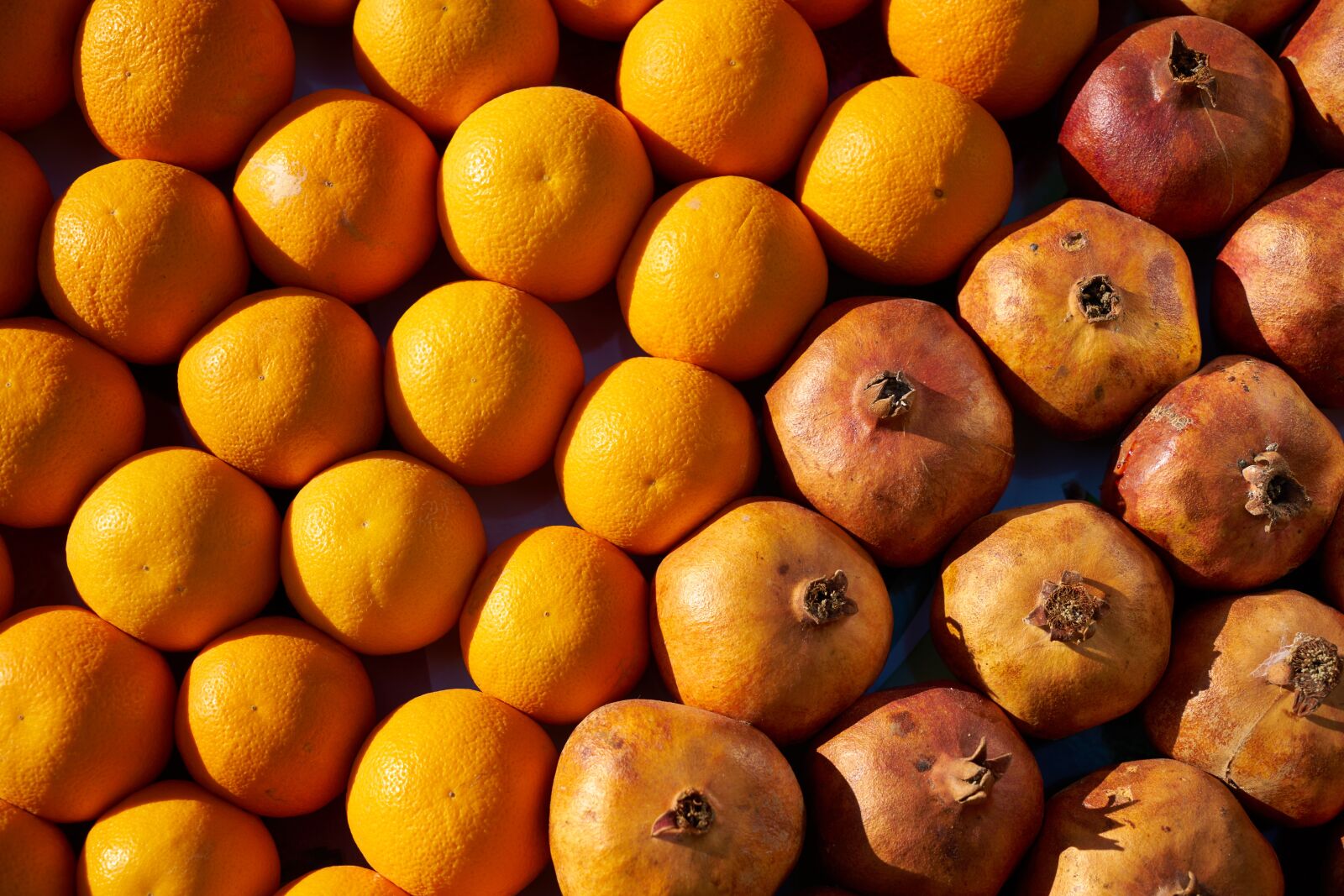 Sony a7R II sample photo. Orange, pomegranate, market photography