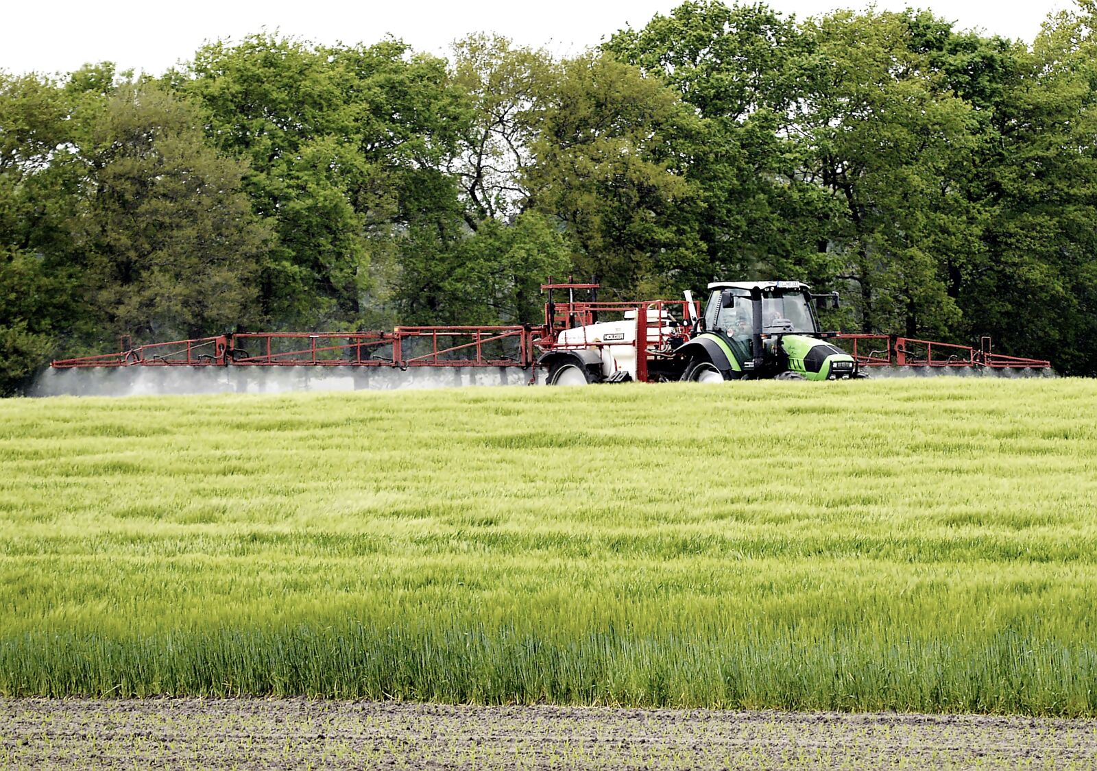 Nikon D3200 sample photo. Fieldwork, tractor, farmer photography
